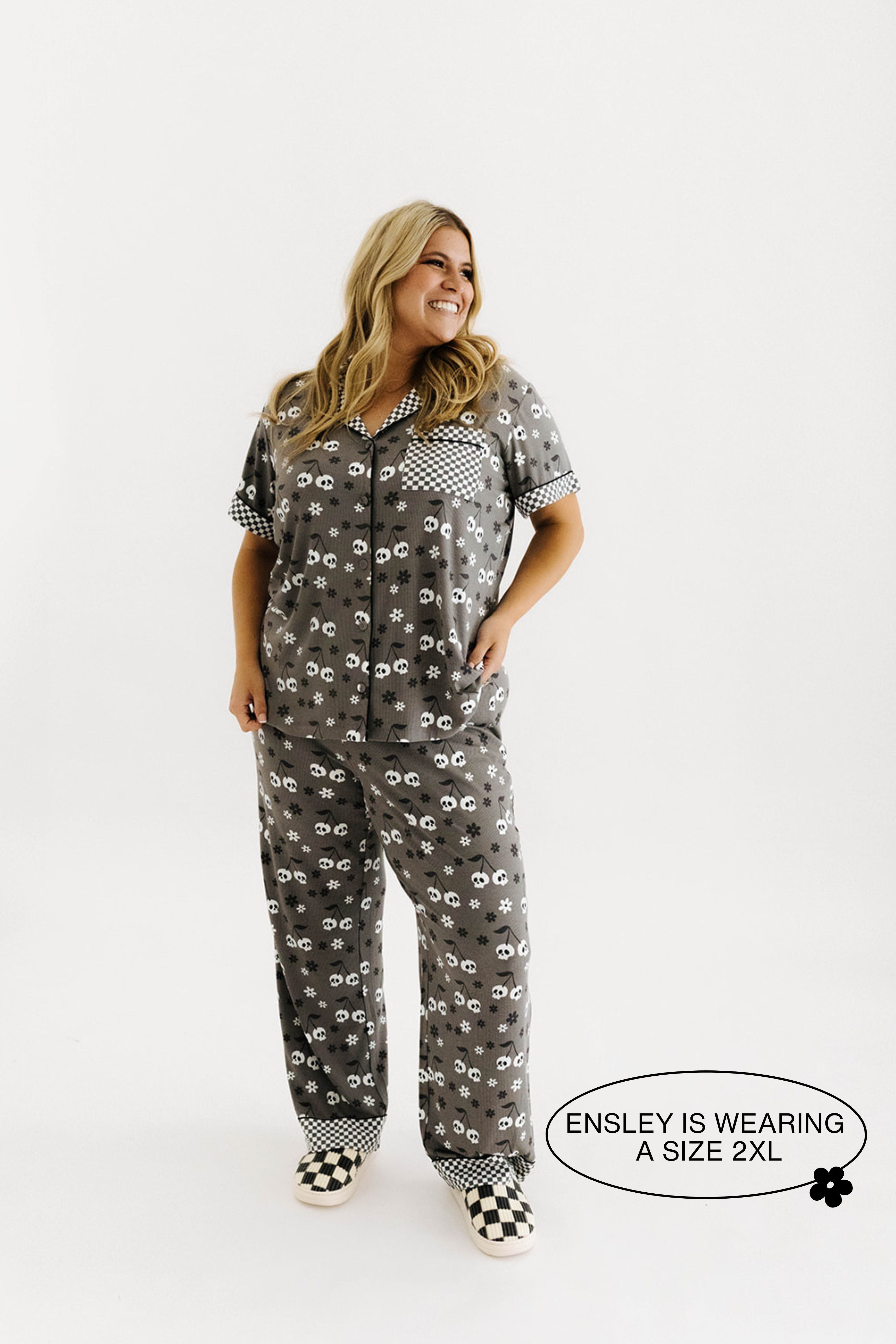 model ensley wearing a size 2x in skeleton pajamas