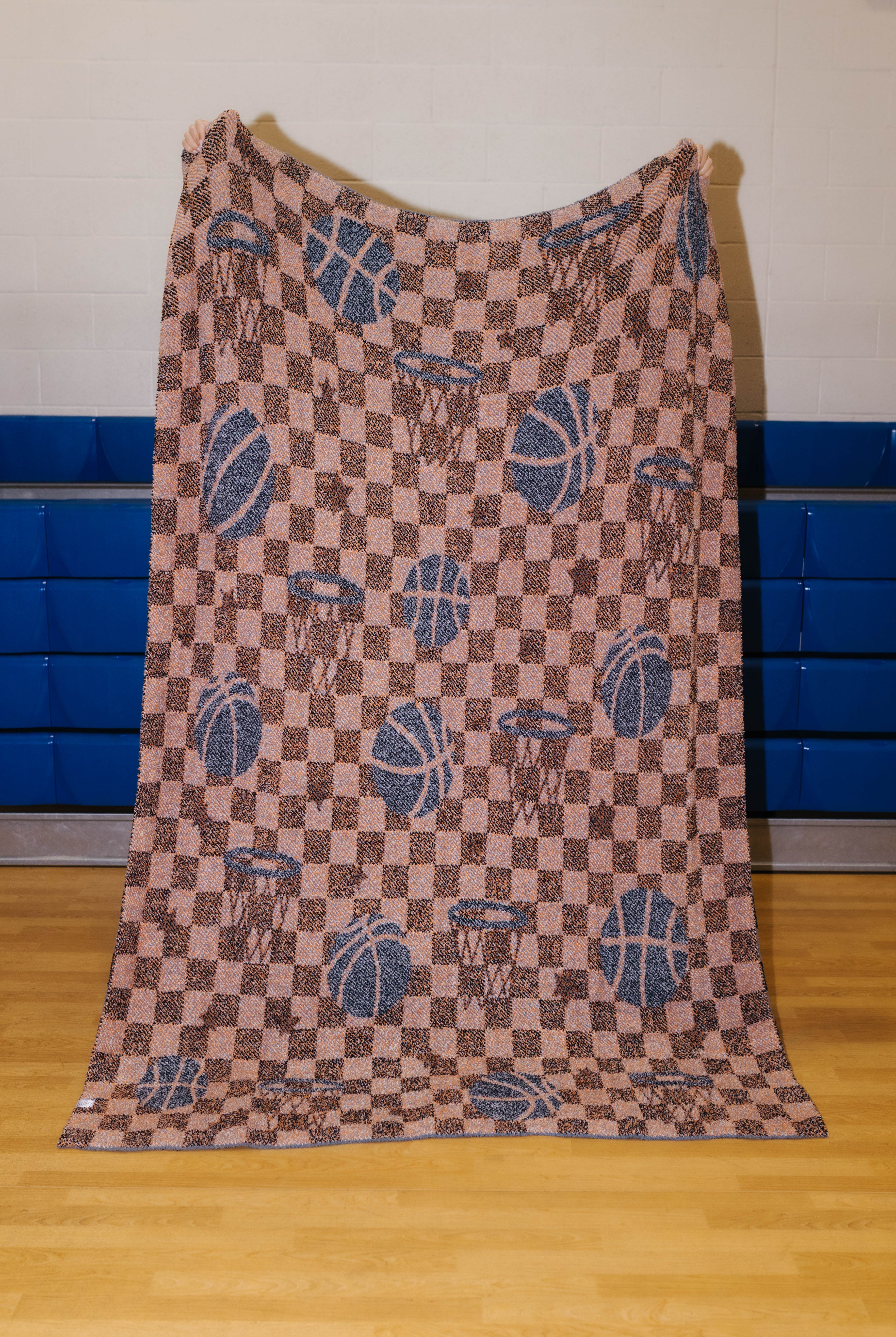 Back of the basketball blanket showing mostly orange/grey pattern