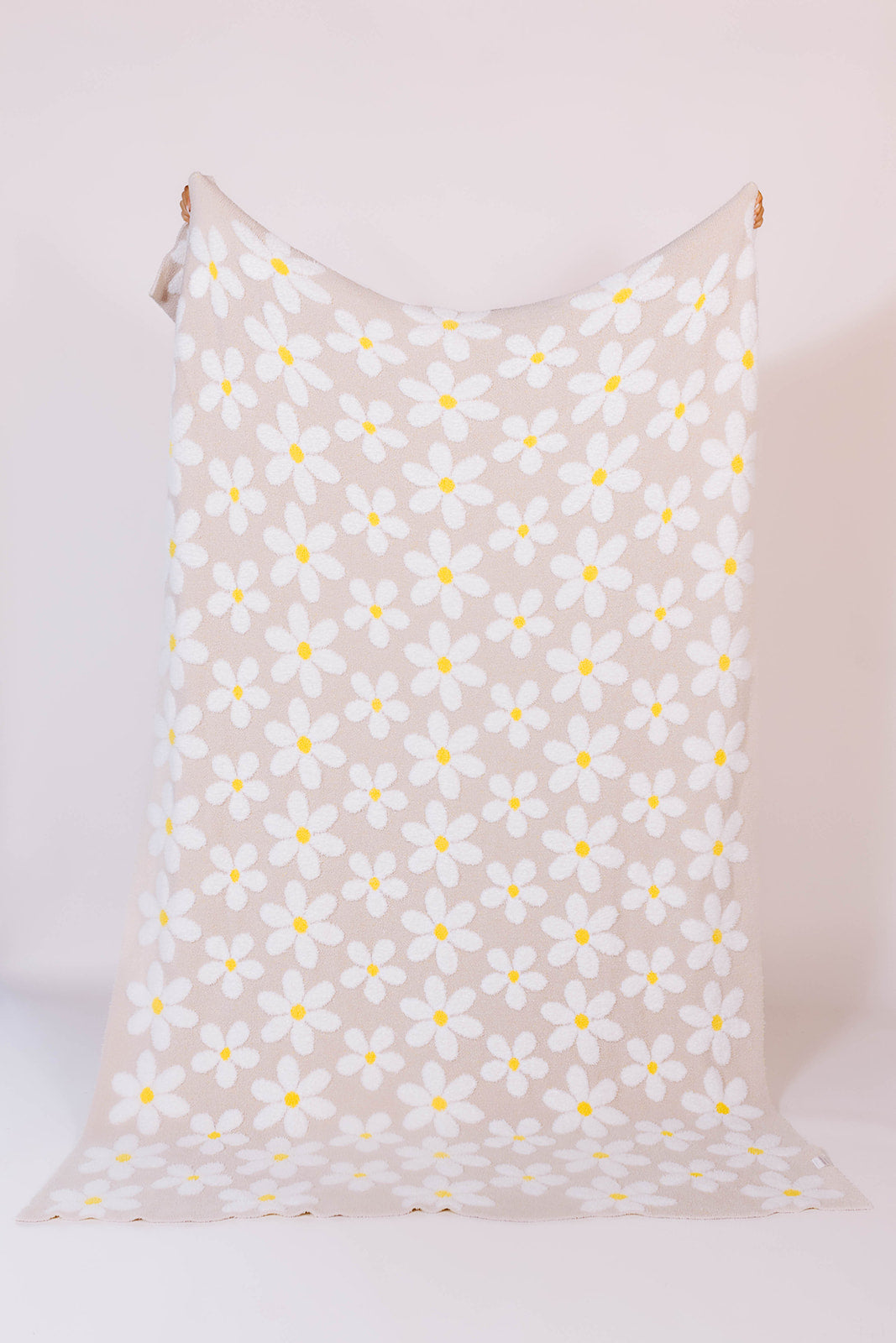 front of the floral raised daisy blanket