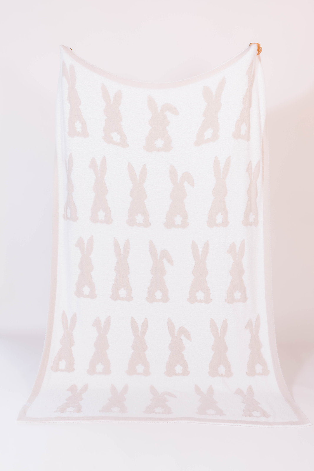 60*80 blanket with white bunny pattern on a white background