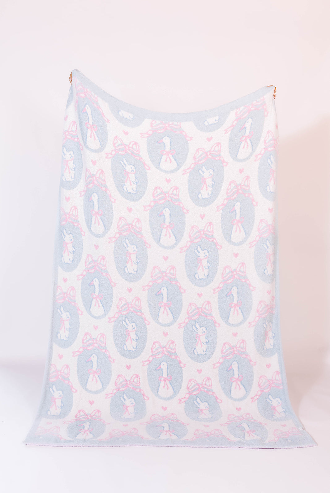 Blanket with bunny and goose design