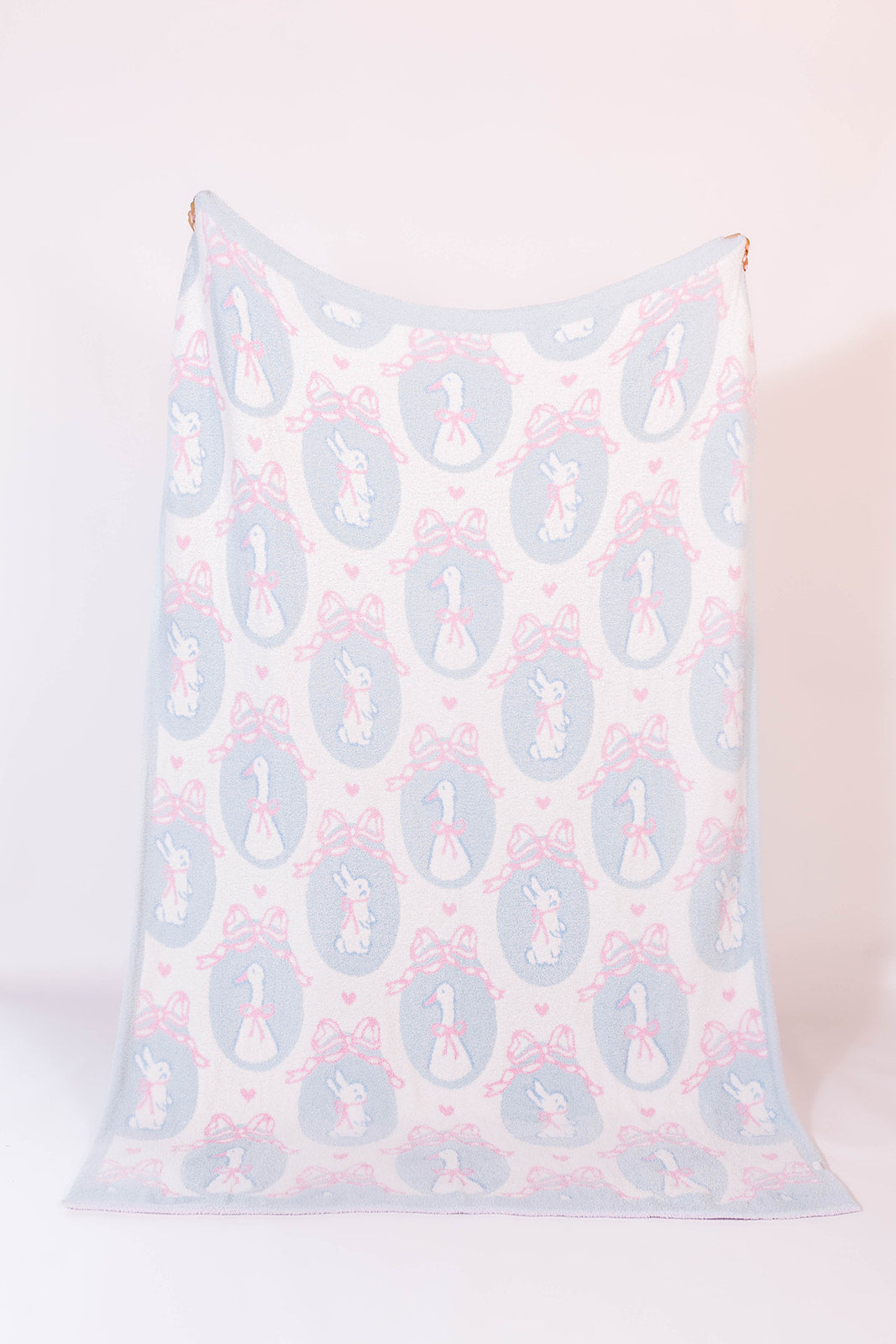 Blanket with bunny and goose design