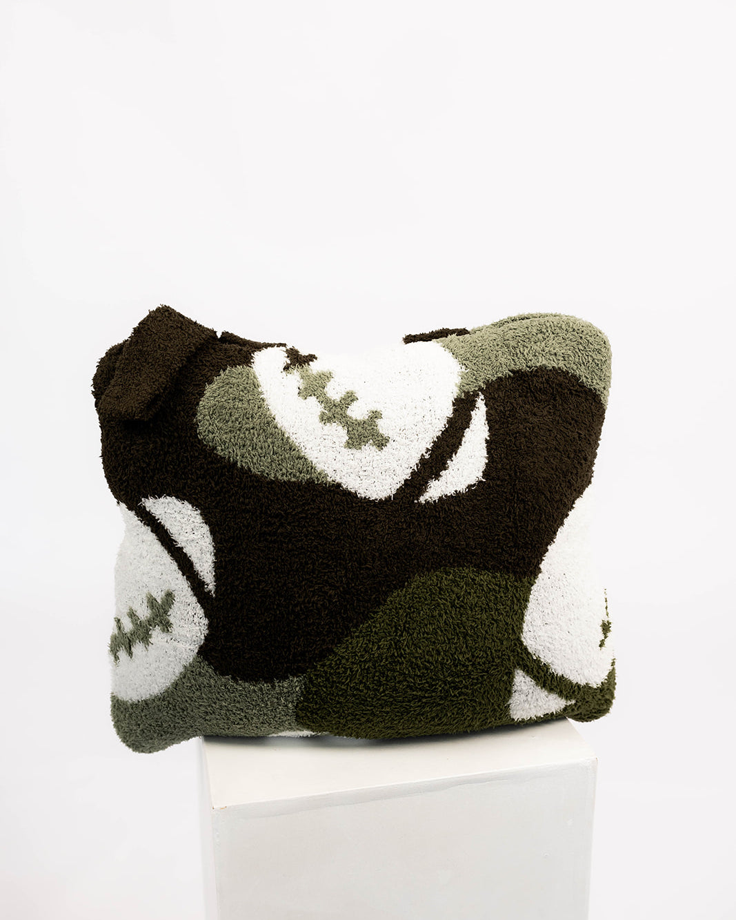 Quillow with football pattern on a white background