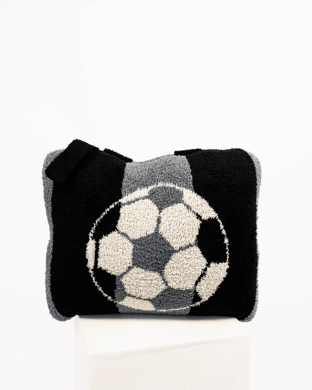 Black and gray quillow with a soccer ball design on a white background