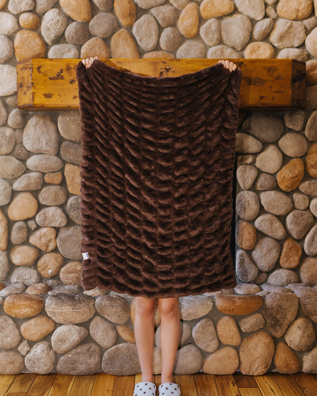 Brown faux fur kids blanket held open.