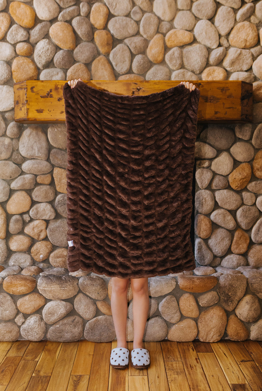 Brown faux fur kids blanket held open.