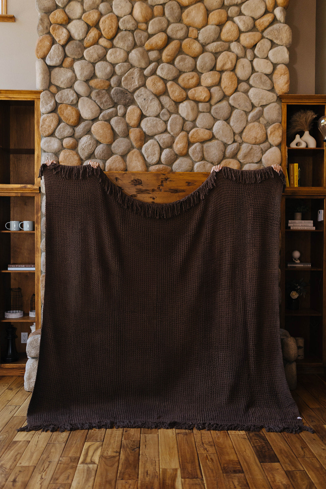 Brown waffle fringe blanket held open at full size.