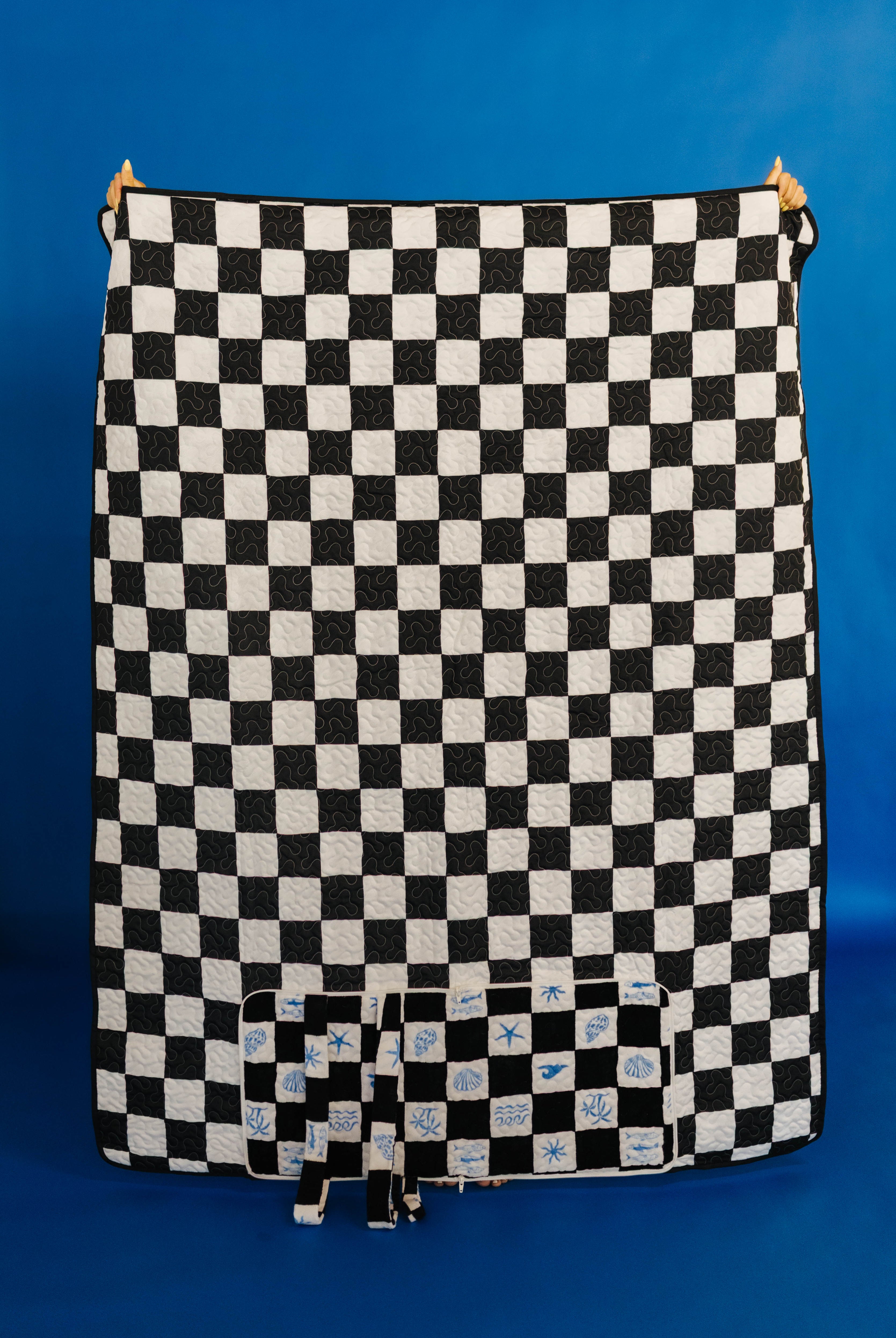 other side of black and white checkered picnic blanket