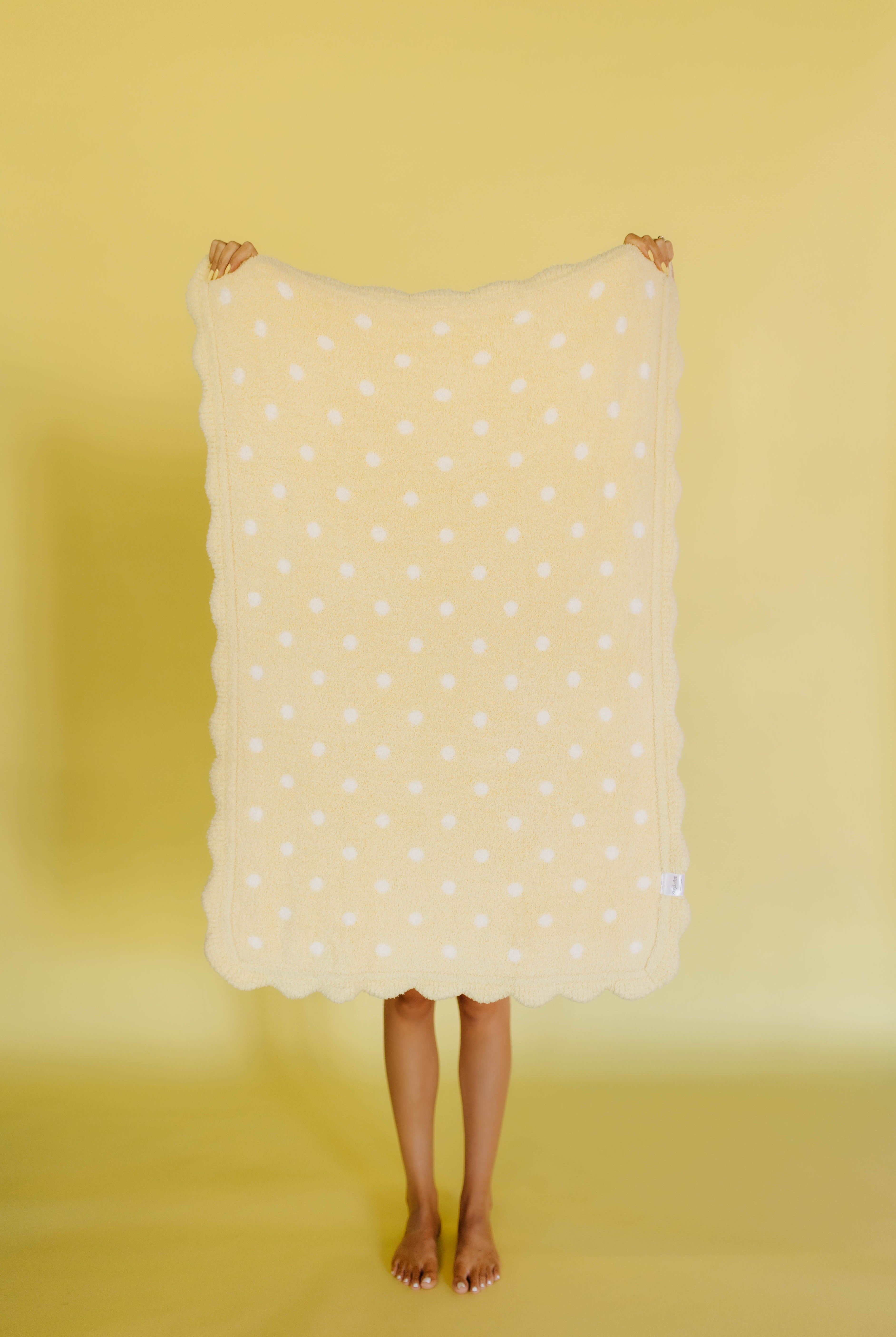 yellow side of the butter yellow polka dot blanket