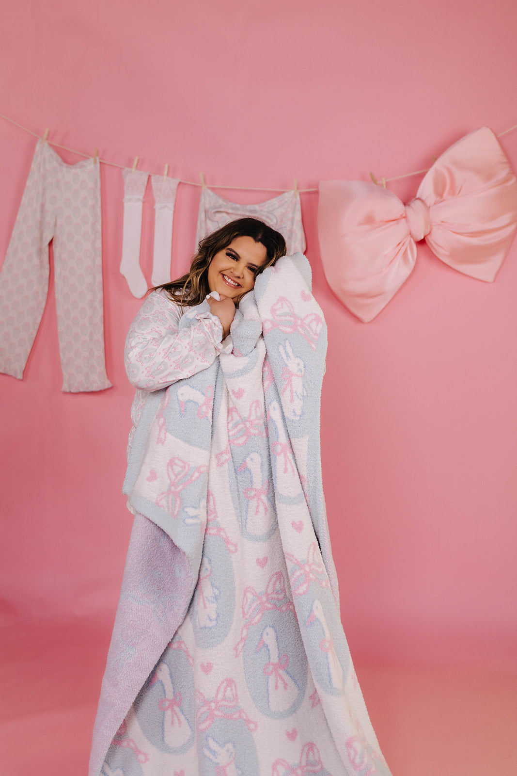 woman cuddling with the blanket