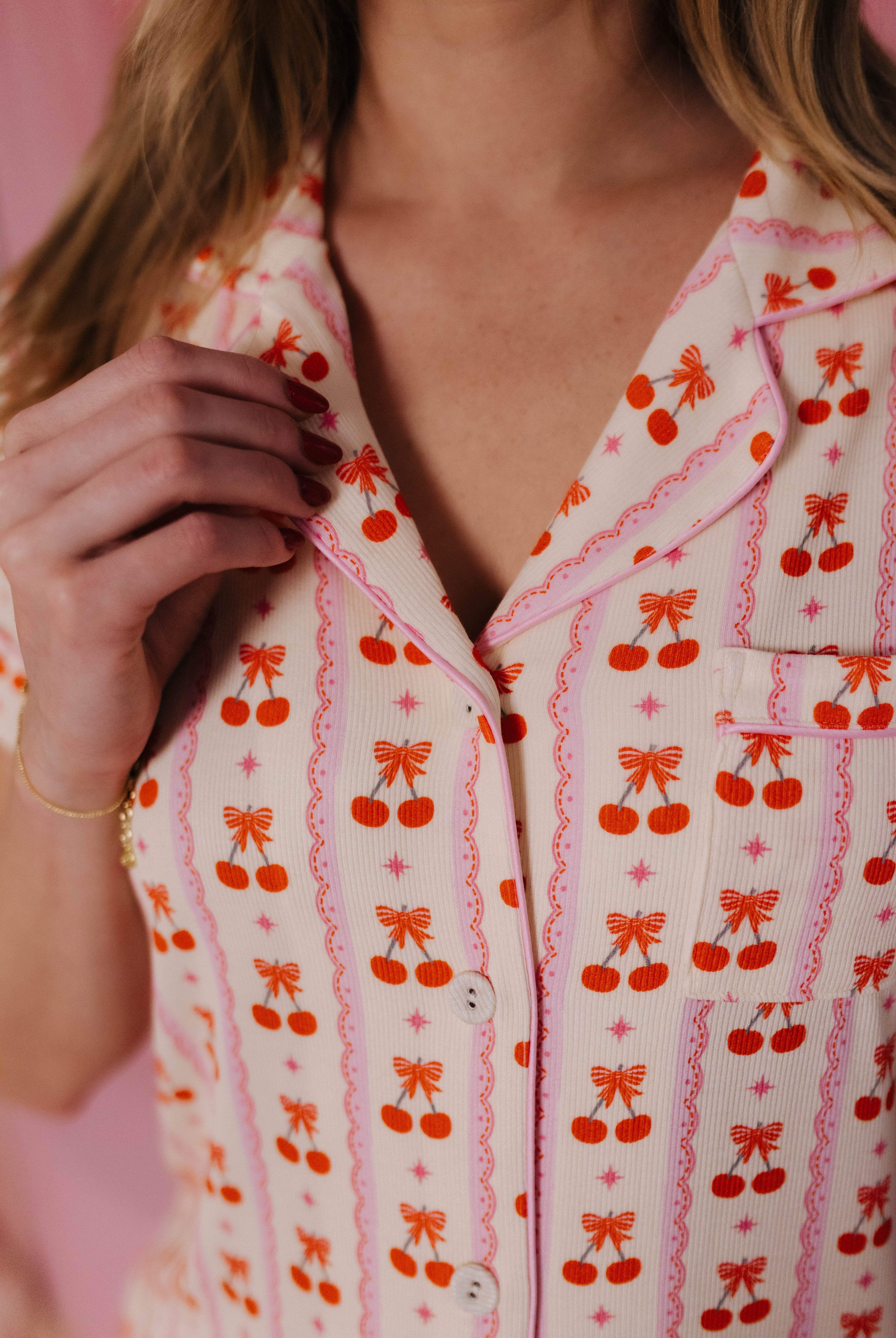 Details of the cherry bow pjs close up