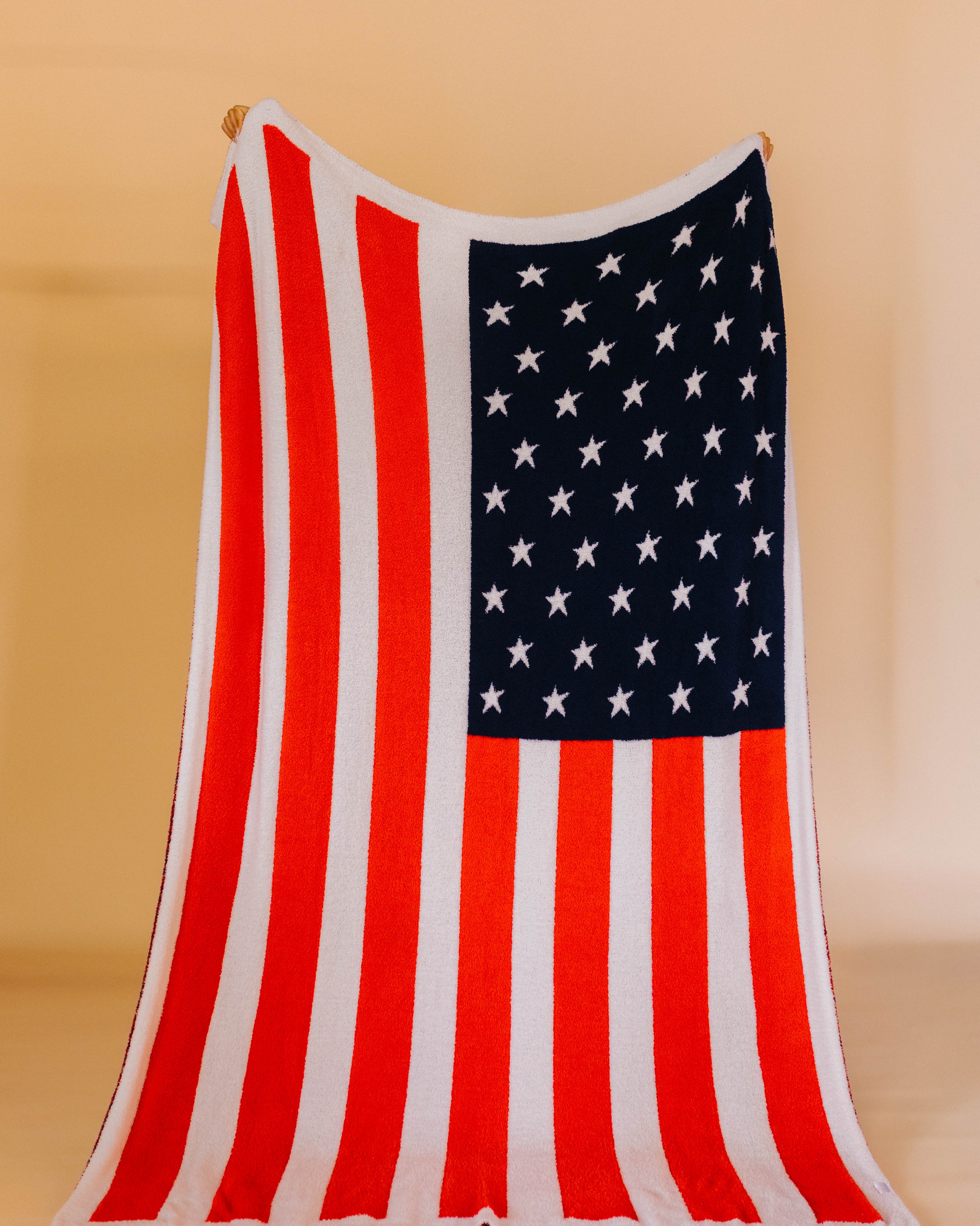 holding up the american flag blanket