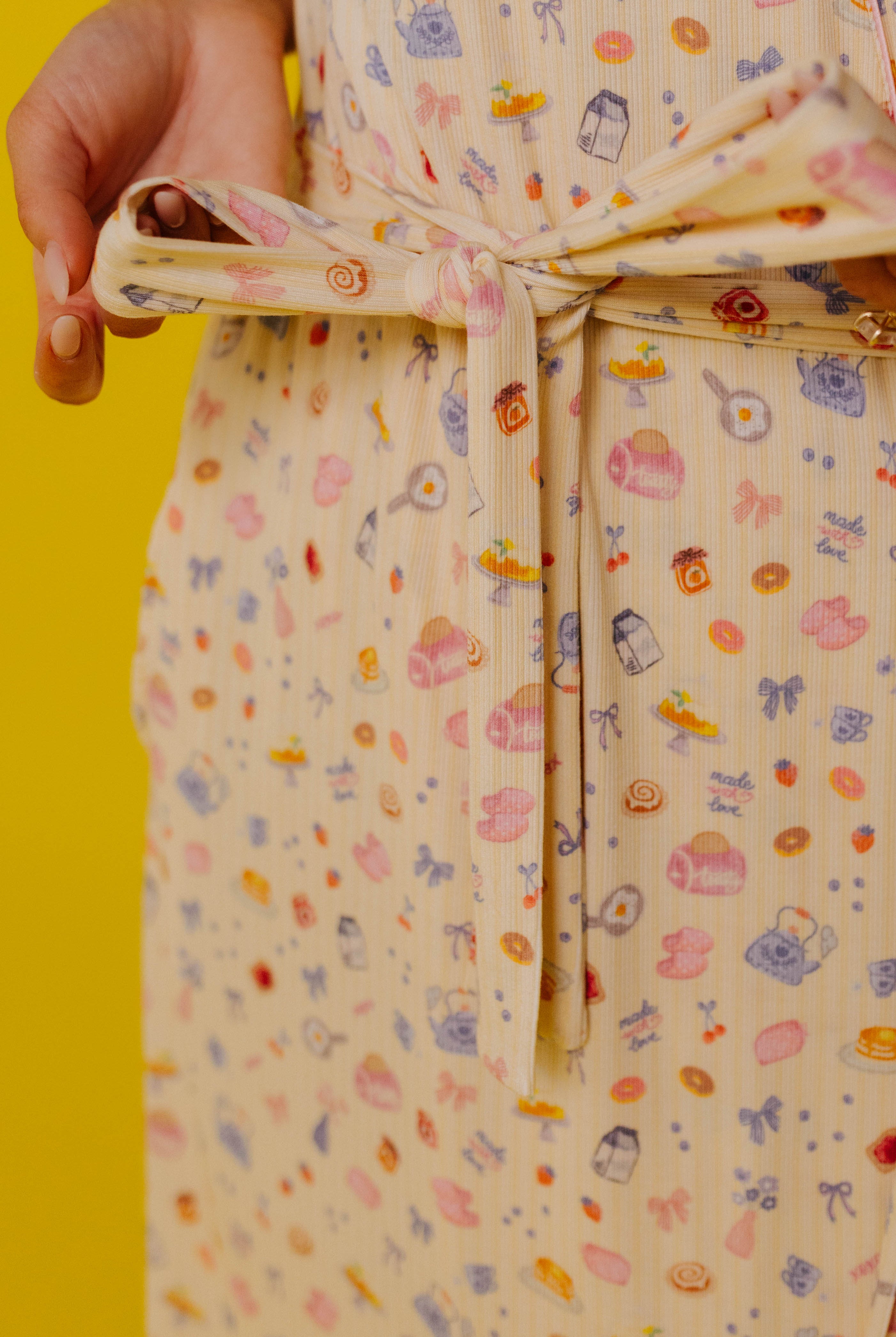 Close up of the brunch detail on the yellow robe