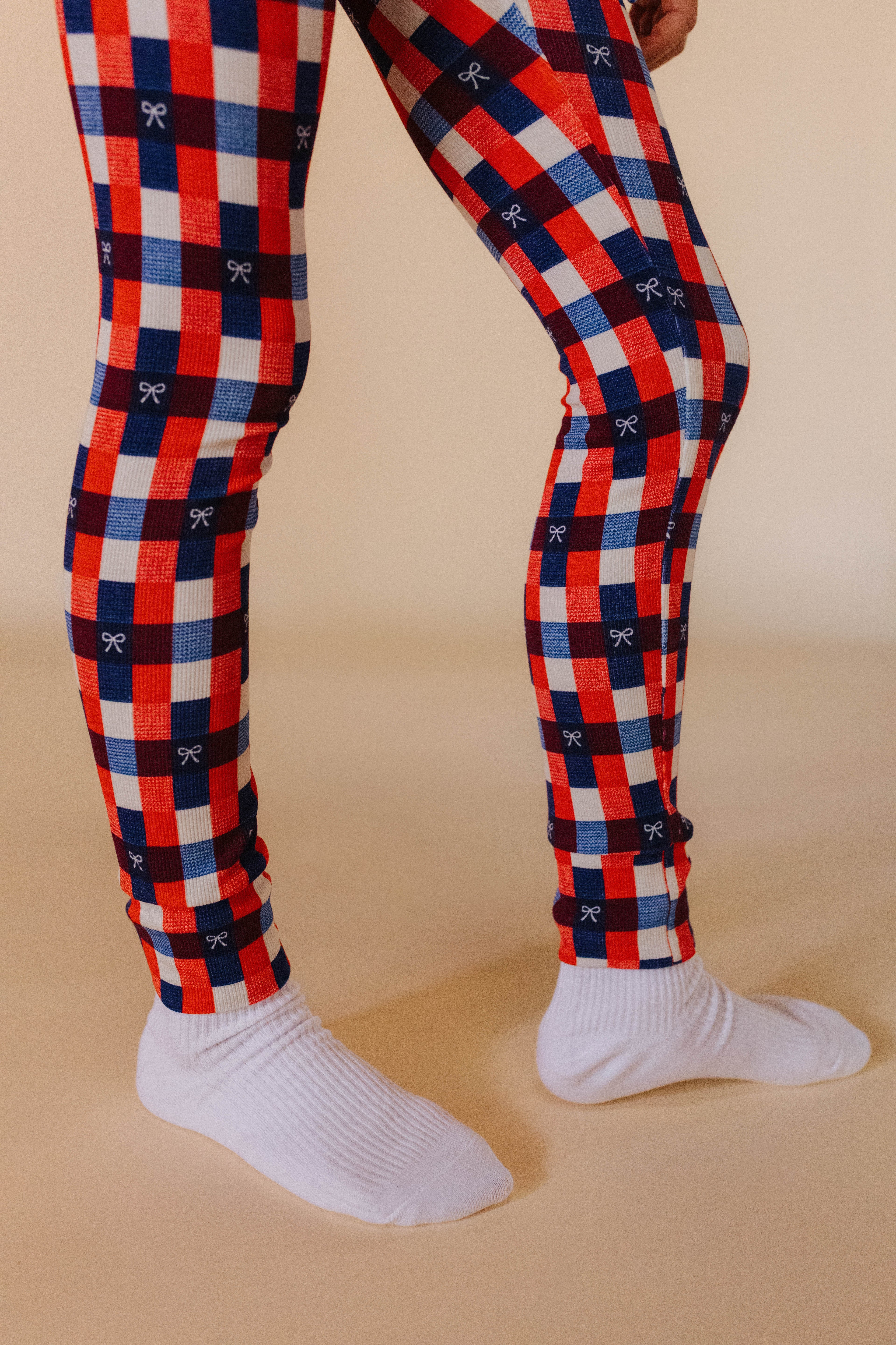 showing the tight leg detailing on the pants
