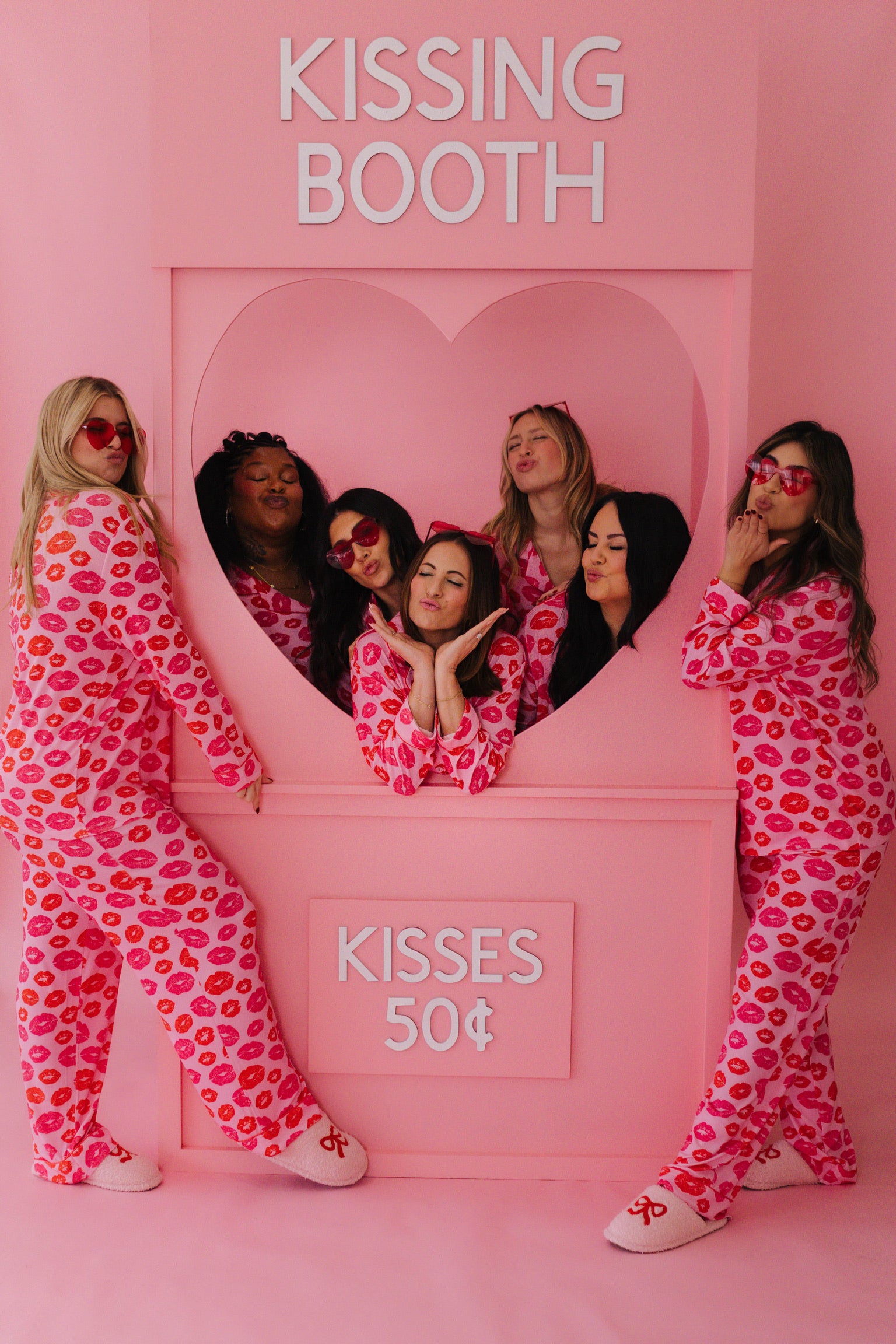 All of the models in the kiss pjs in the kissing booth set