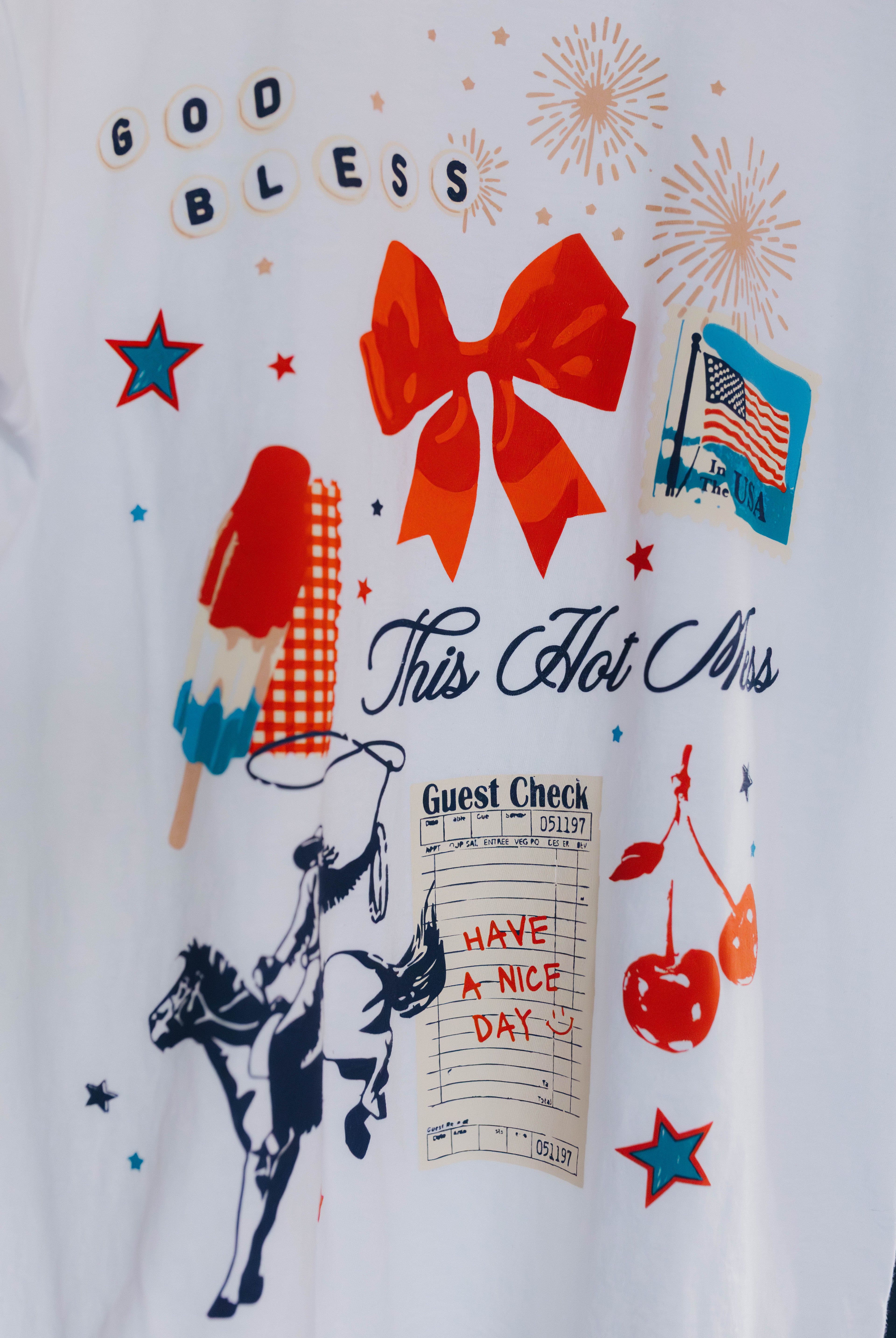 close up of the white tee with icons on it