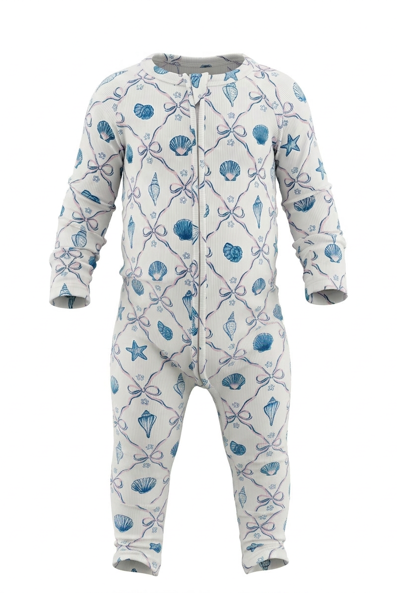Children's onesie with blue shell themed pattern on a white background