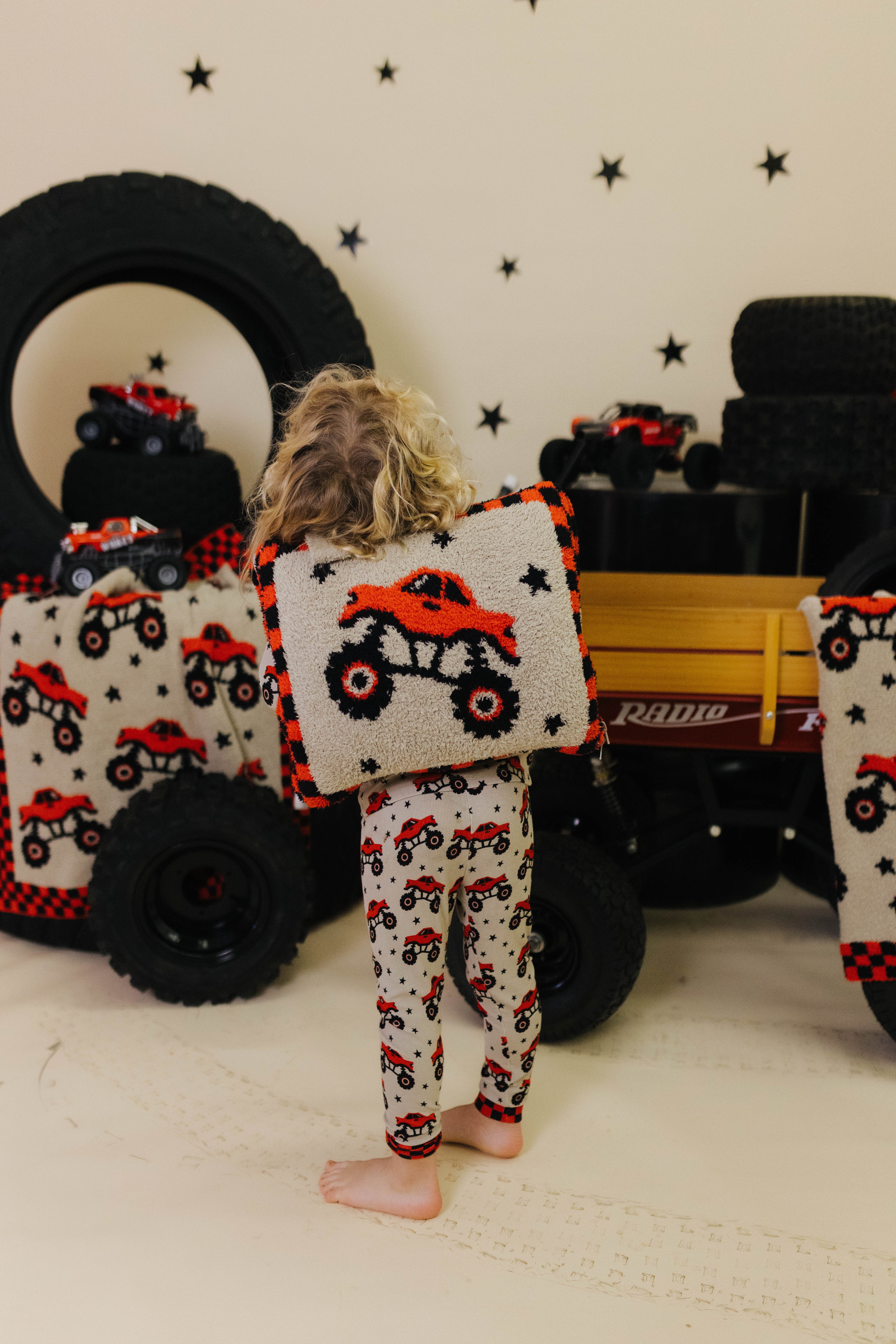 Kamp wearing the monster truck quillow on his back