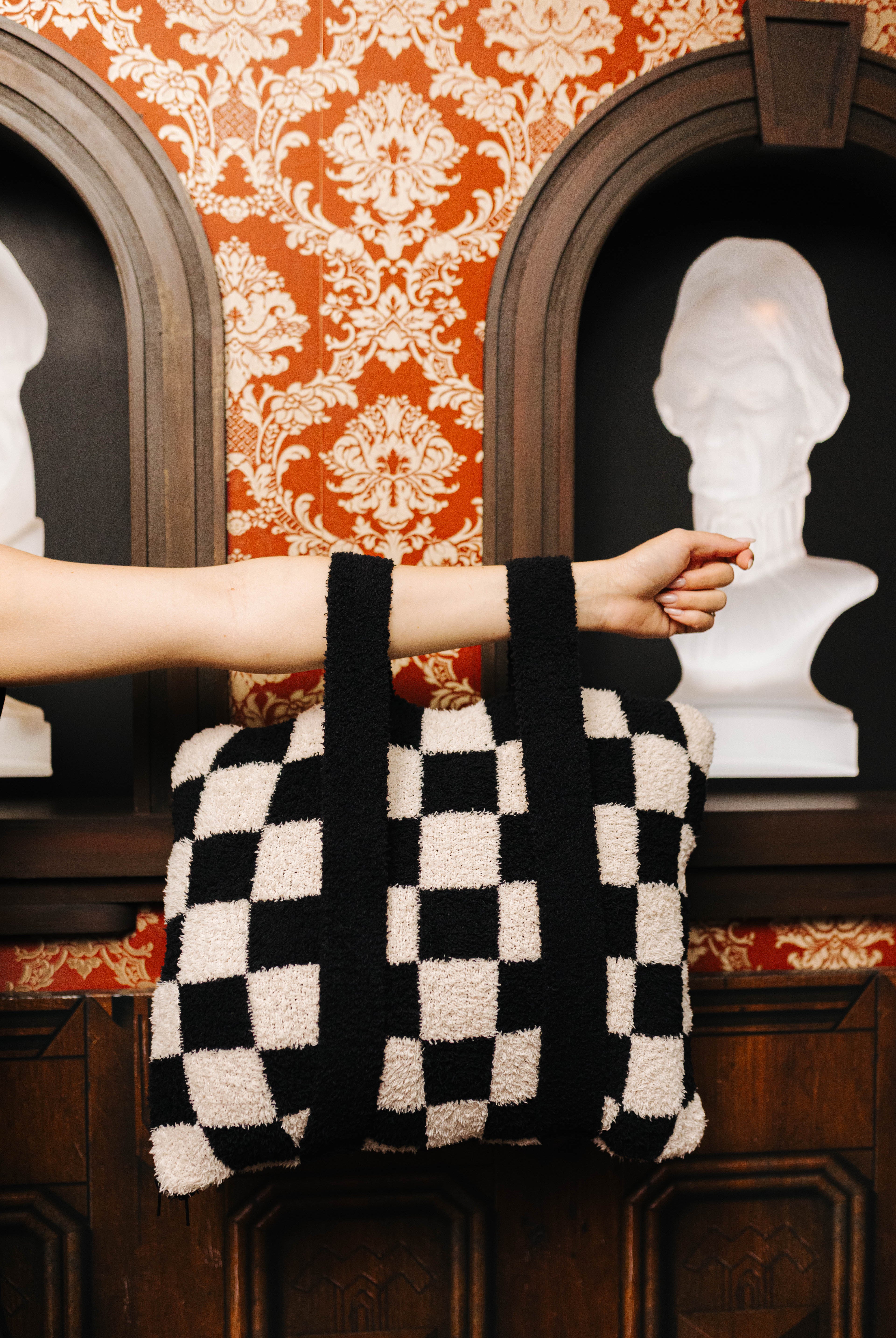 Sand & Black Check Quillow 50x60 shown in a full length lifestyle view