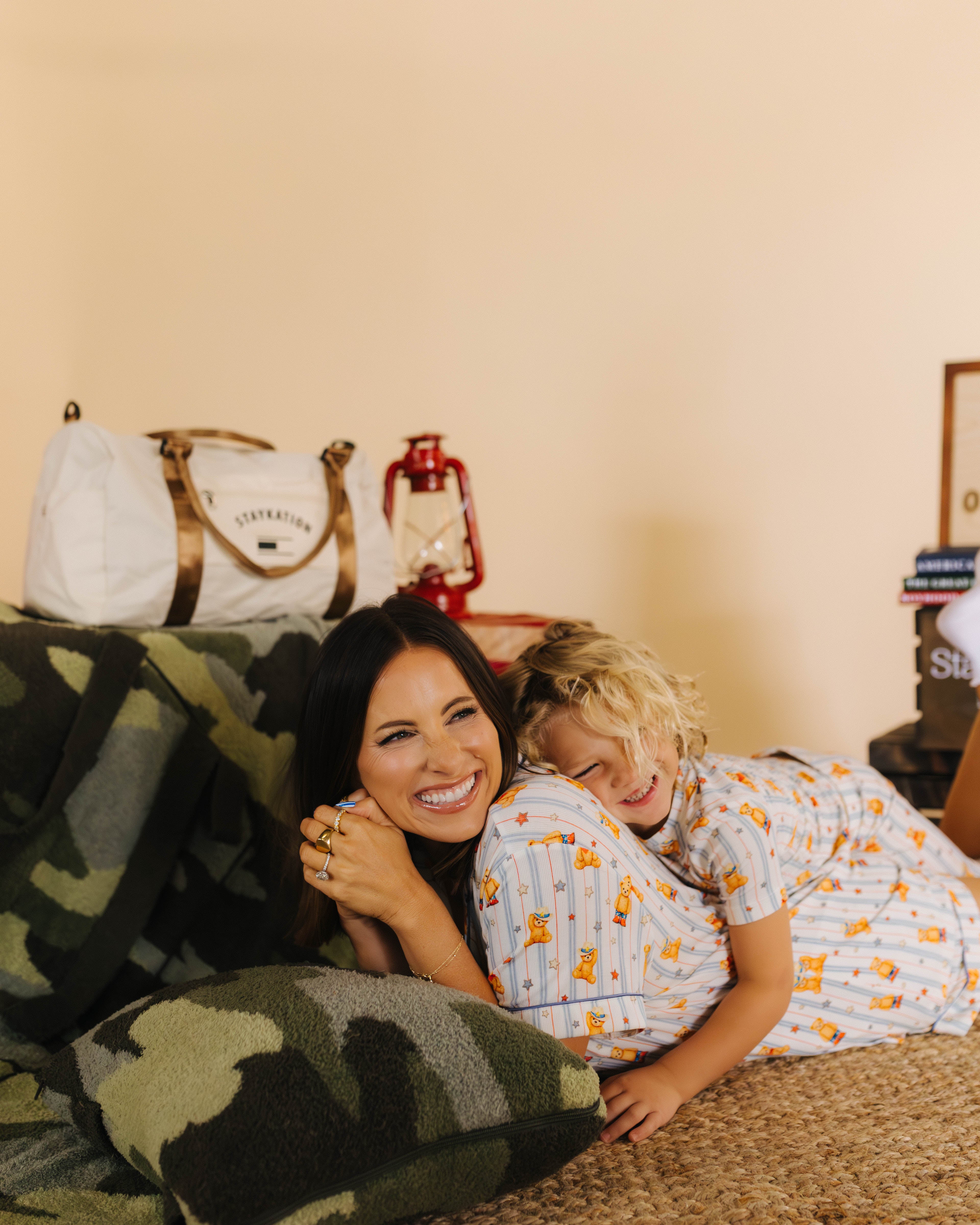 Kamp and Krista snuggling on the camo quillow