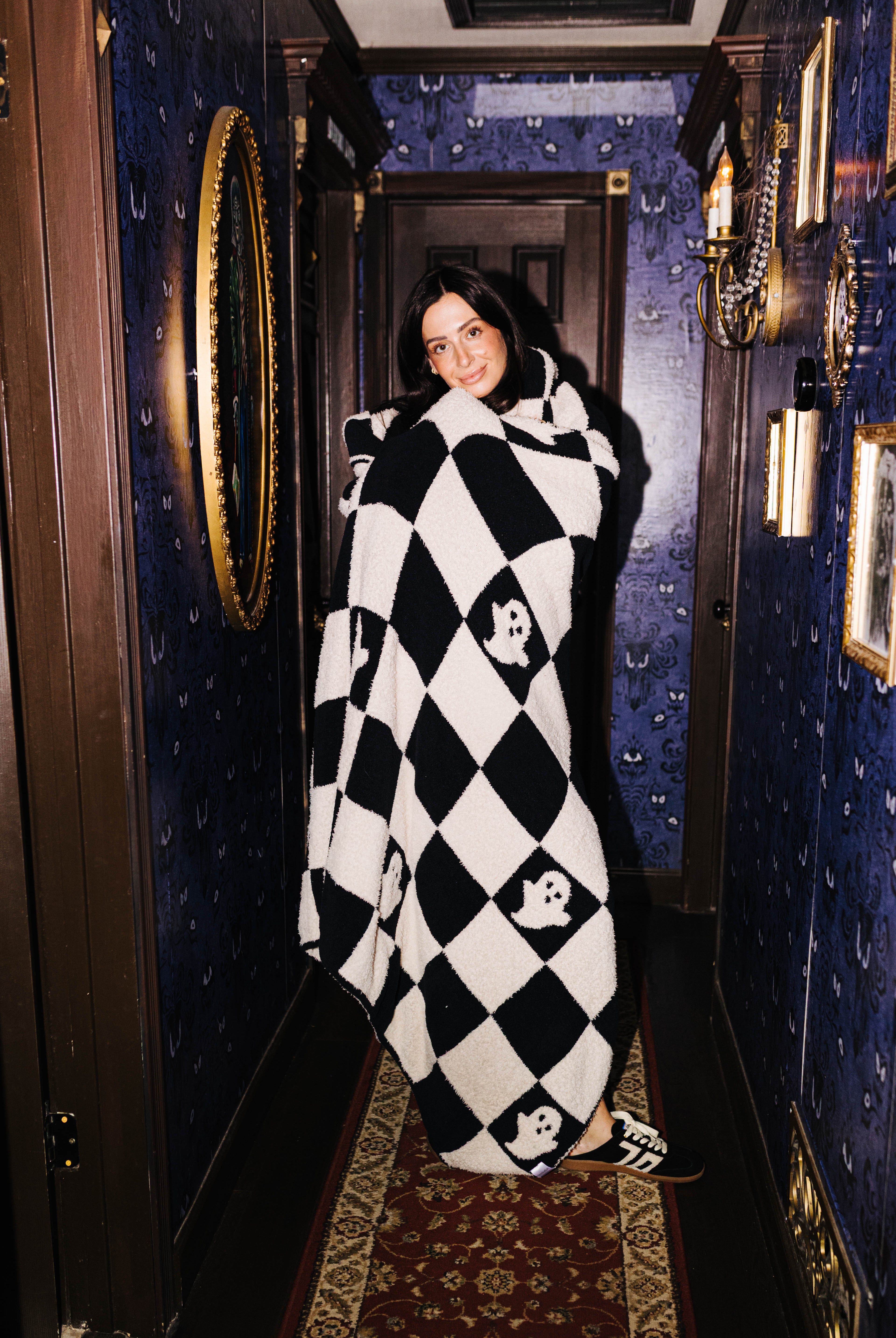 Model wrapped in the Ghost Check blanket