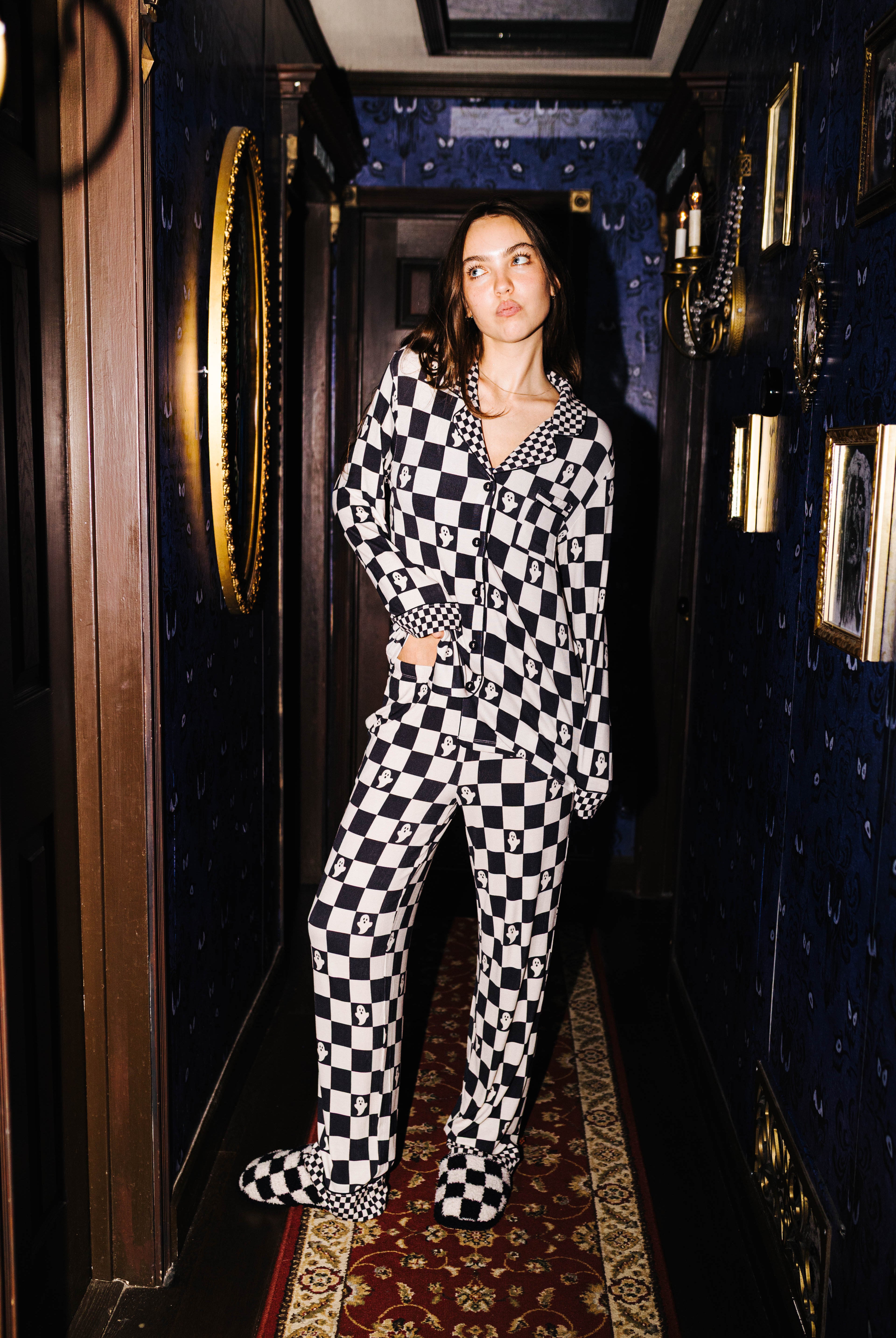 Front view of adult Ghost Check long pajamas on a model