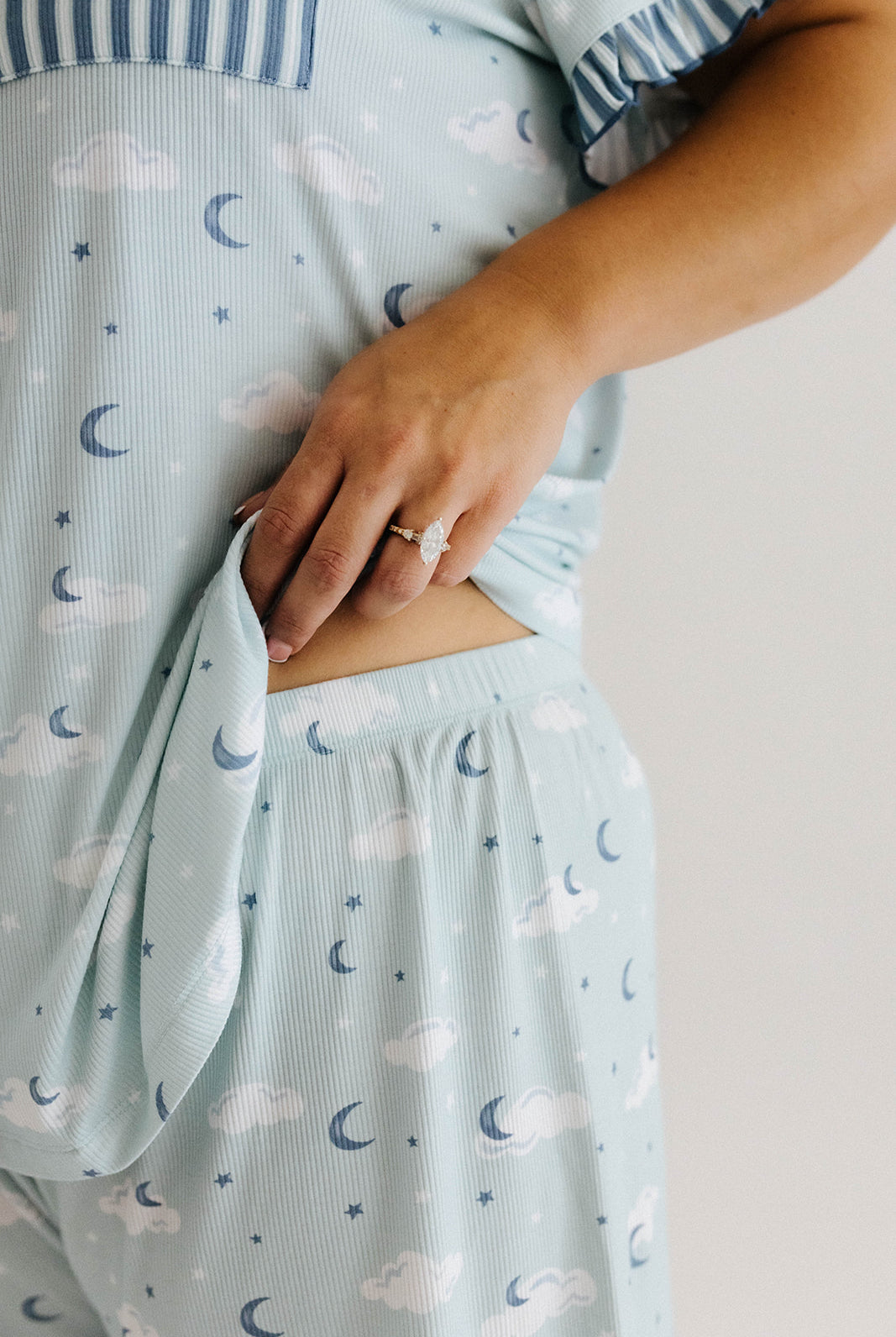 model showing the waistband of the cloud ruffle pajamas