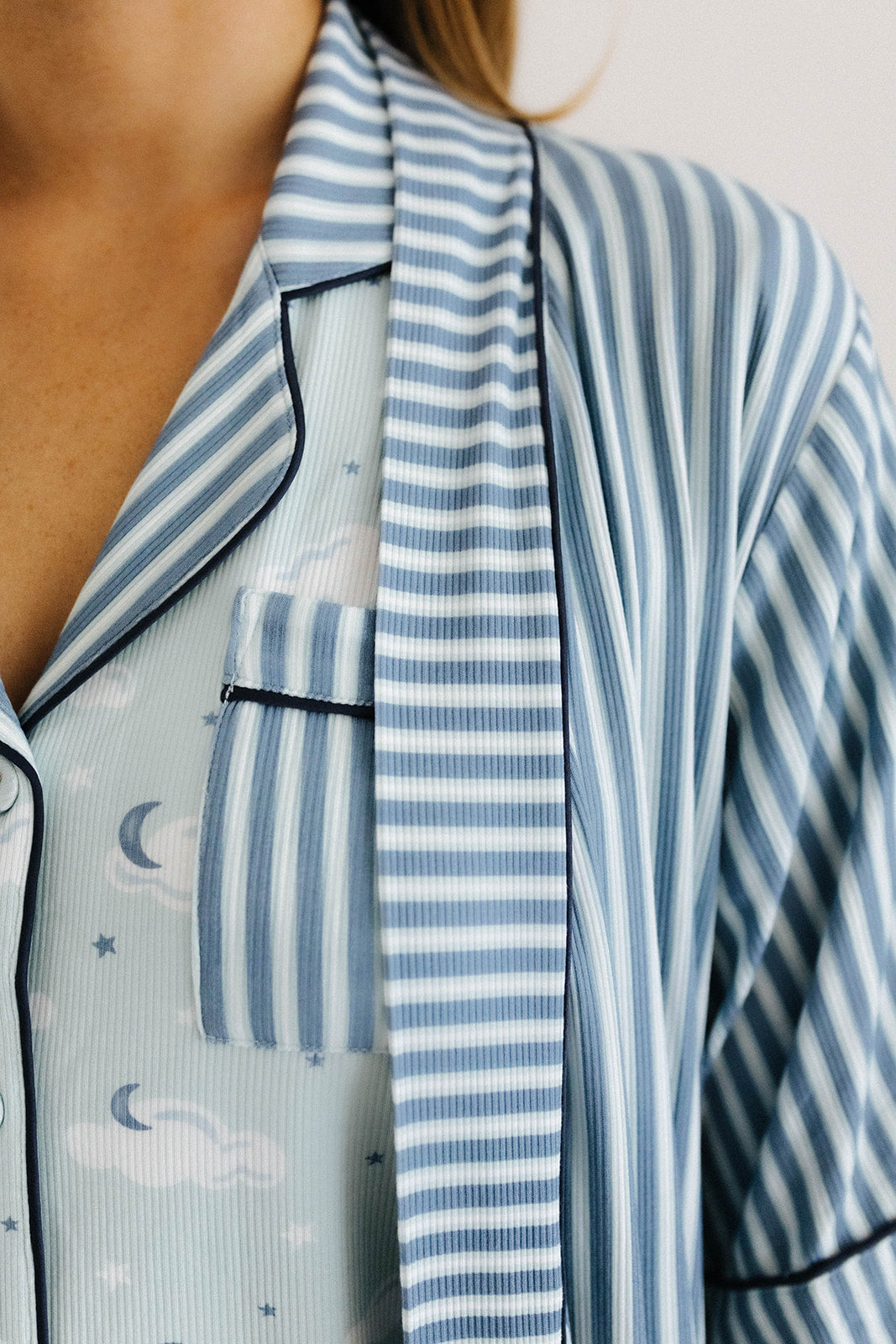 top of cloud pajamas and blue striped ribbed robe