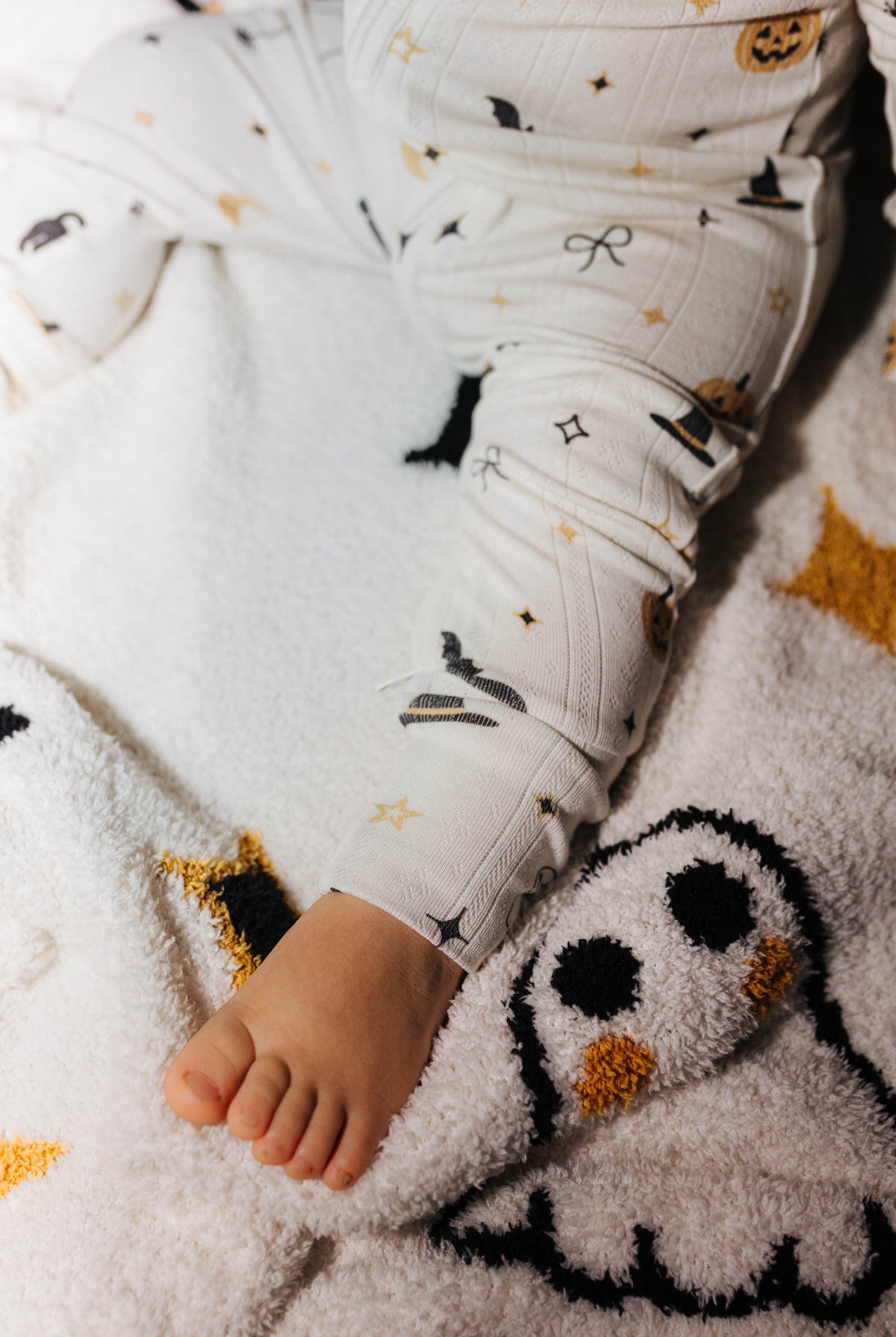 Close view of a ghost motif on the Halloween Icon Print blanket