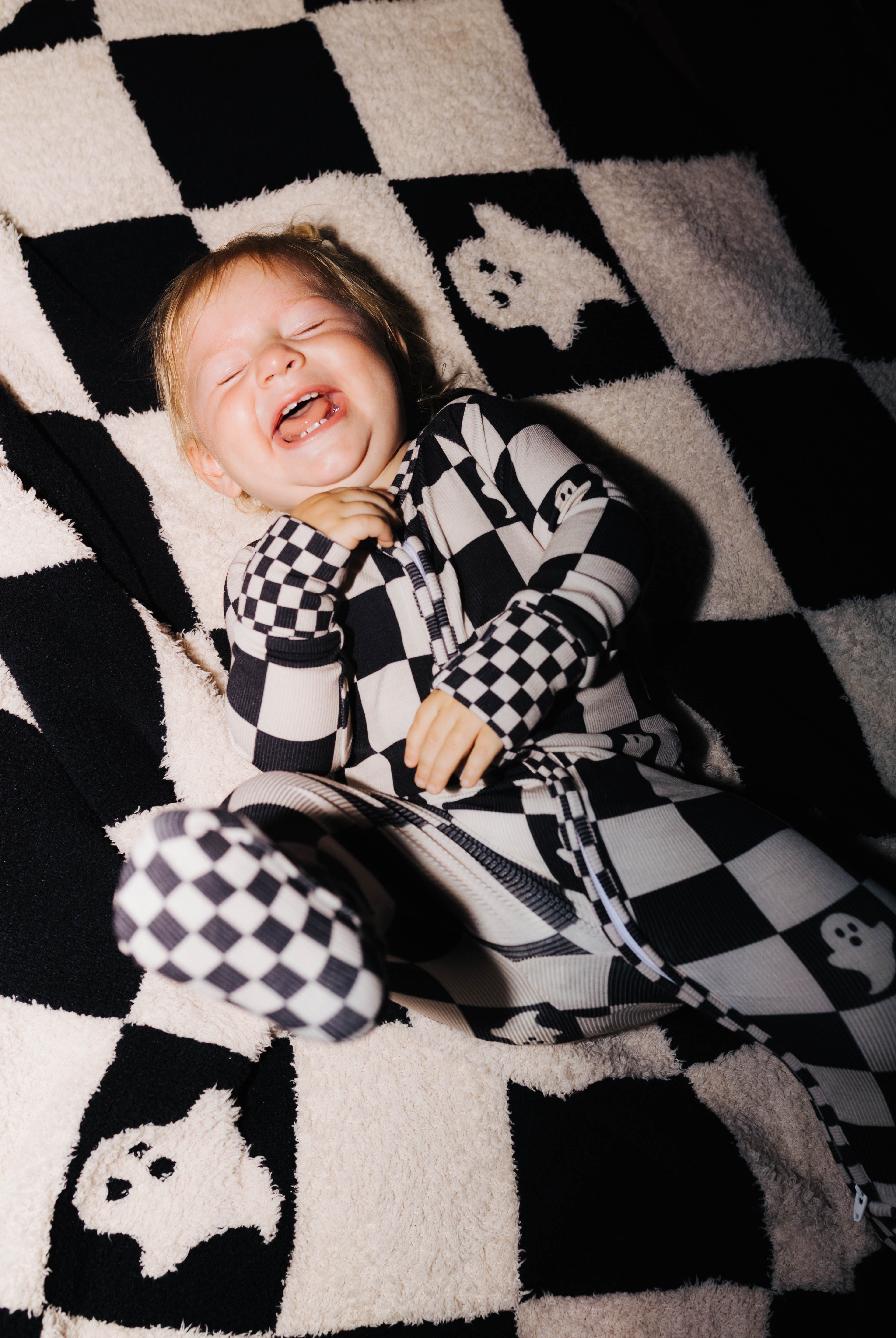 Baby Ghost Check Ribbed Zip Pajamas shown in a closer detail view