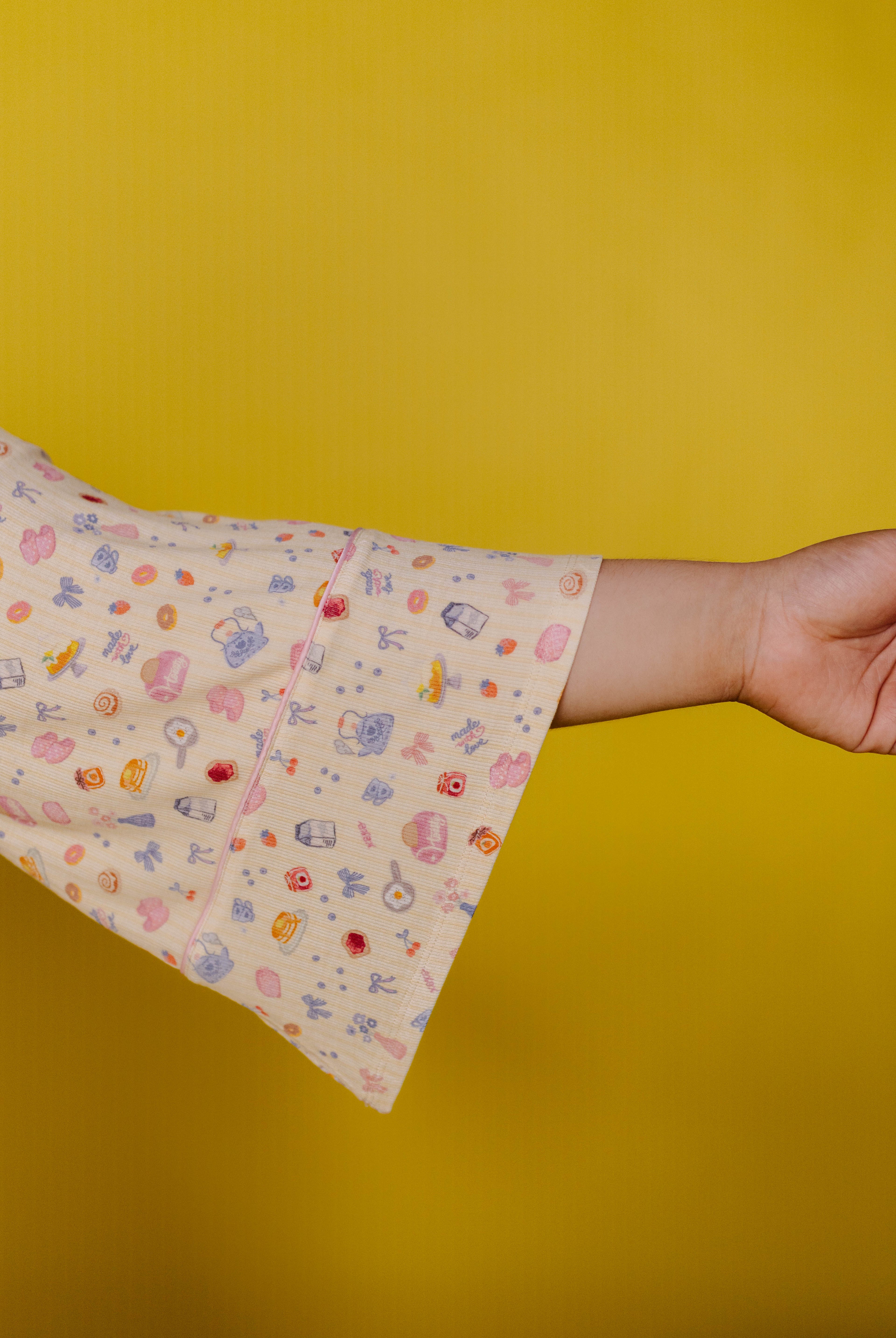 close up of the bell sleeve detail on the robe