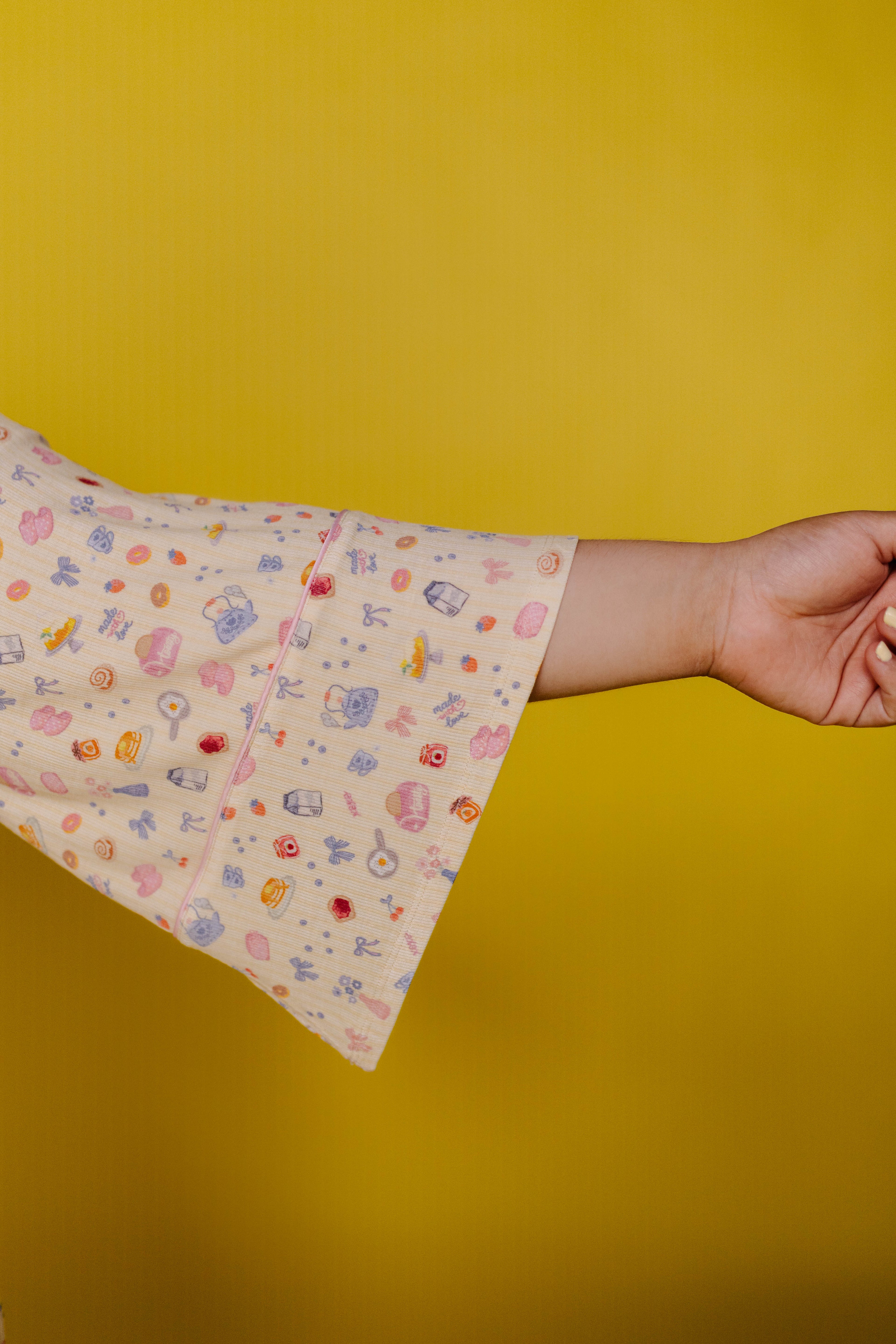 close up of the bell sleeve detail on the robe