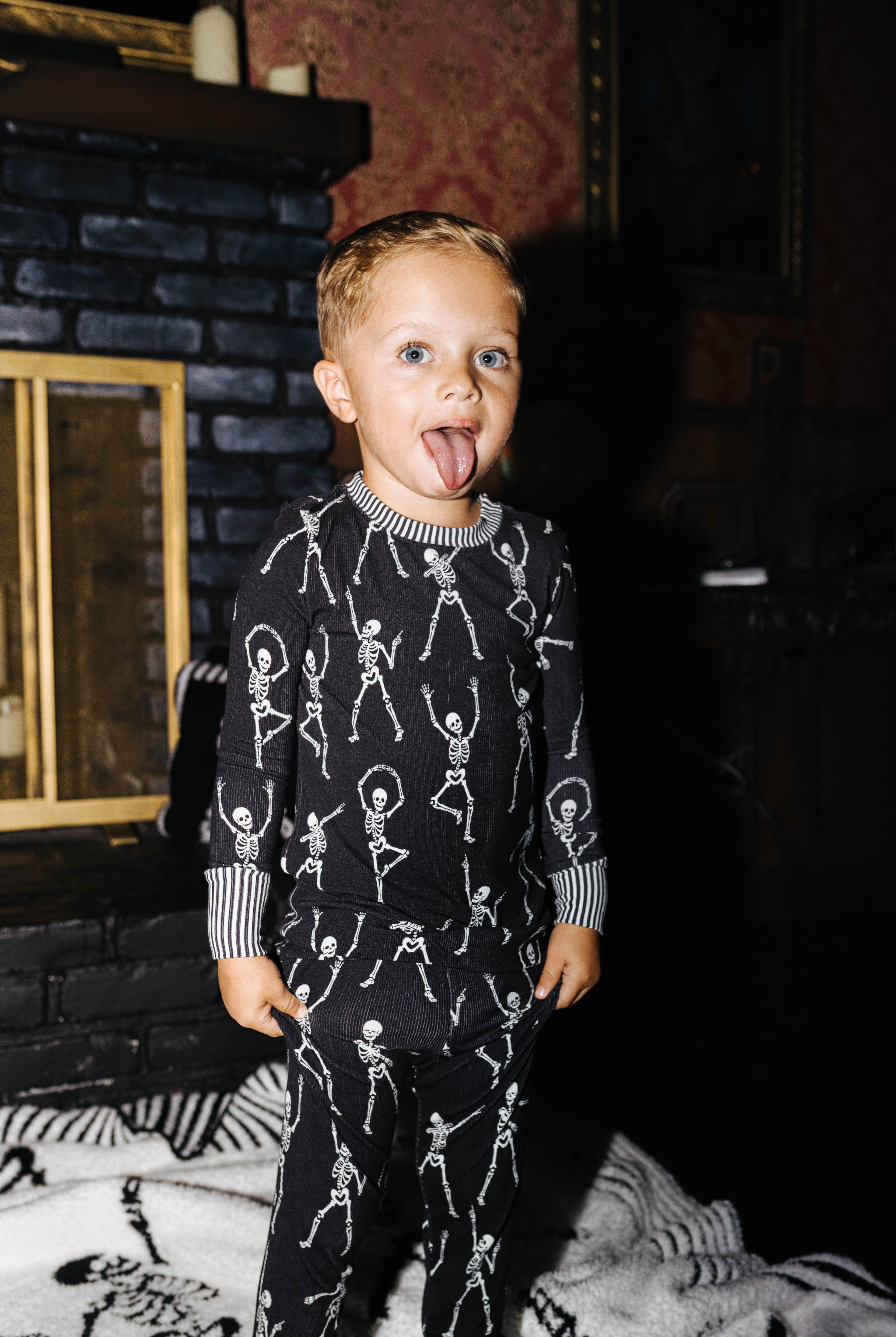 Front view of kids Skelly long pajamas