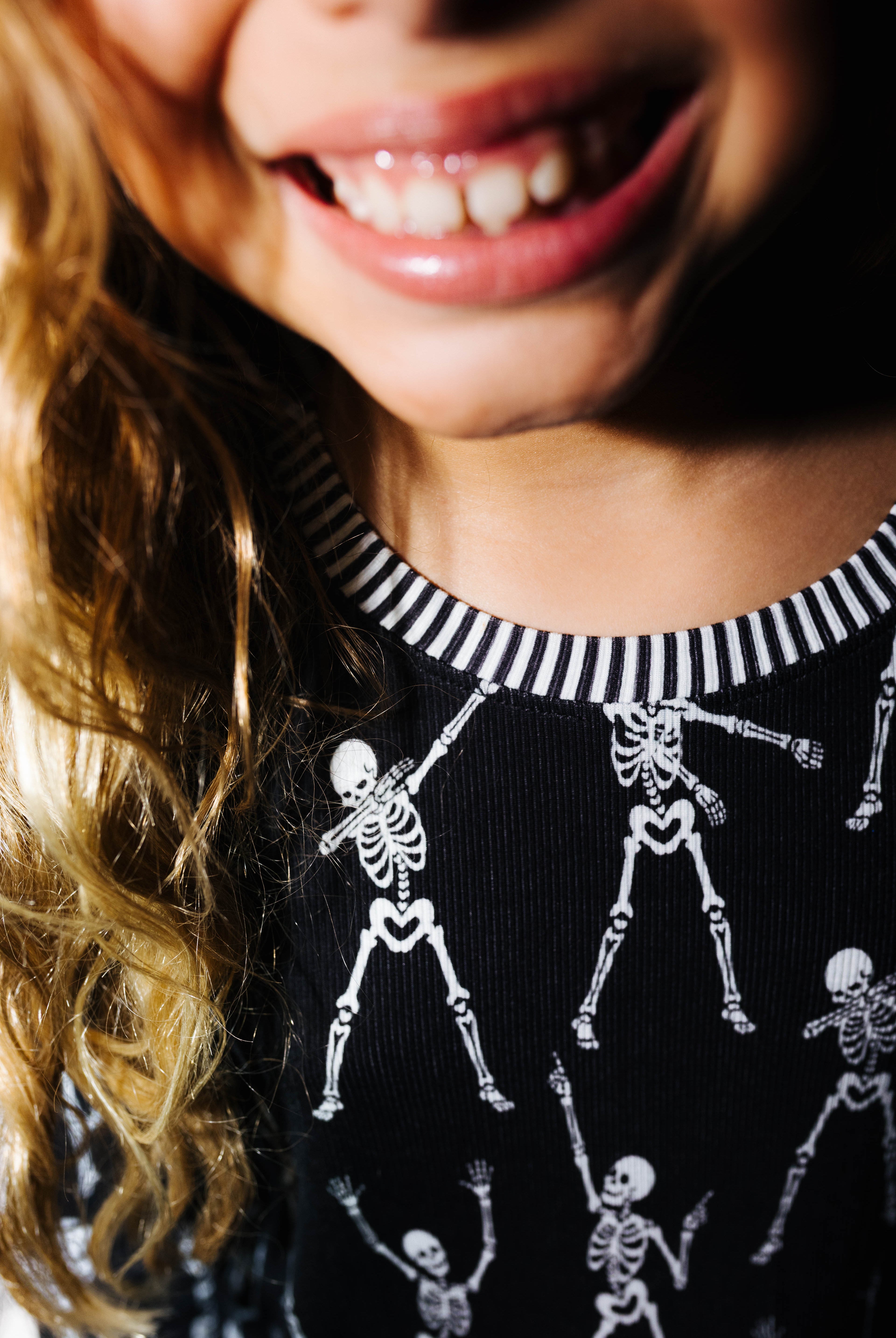 Striped neckline detail on kids Skelly pajamas