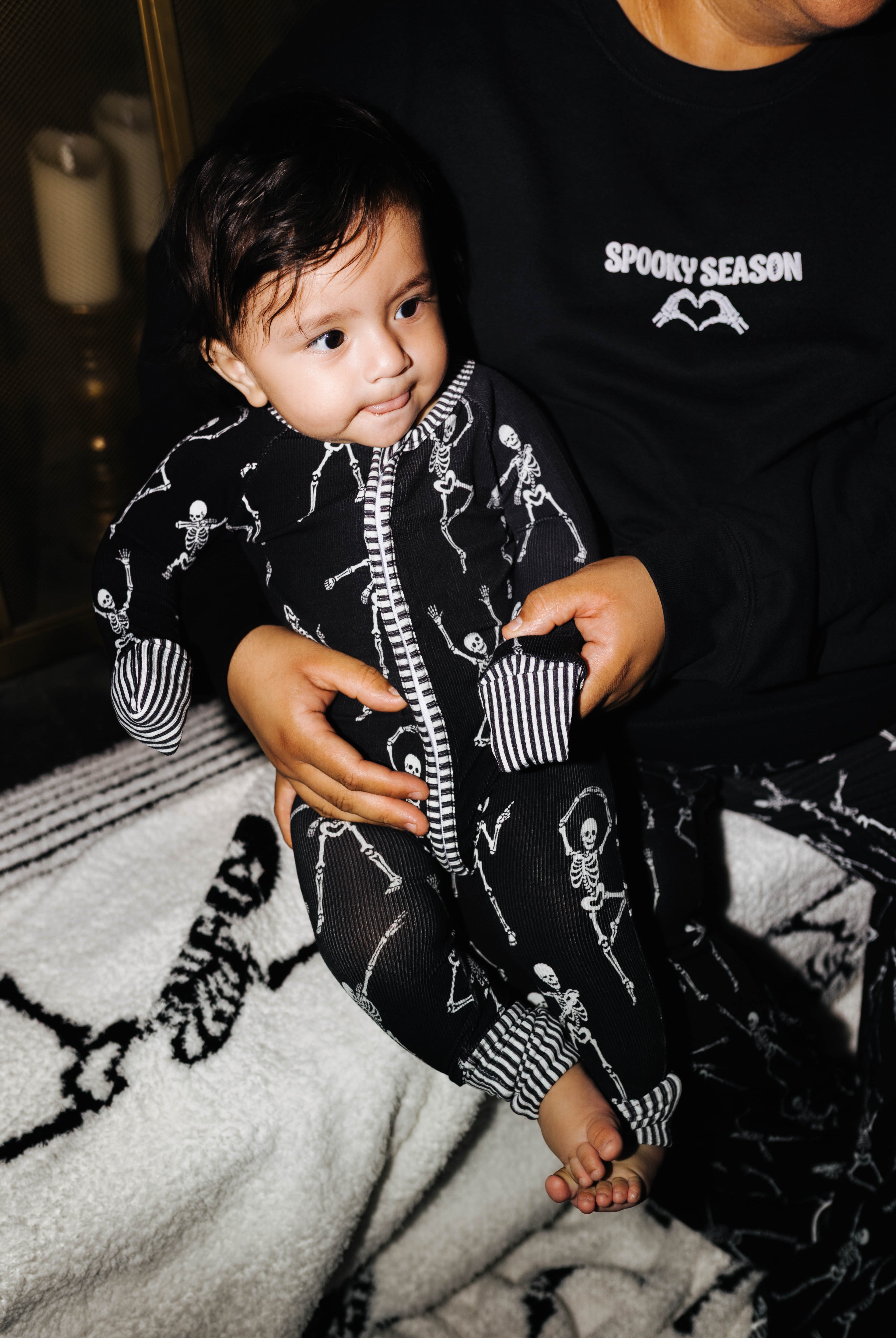 Baby Skelly Ribbed Zip Pajamas shown in a second full length view