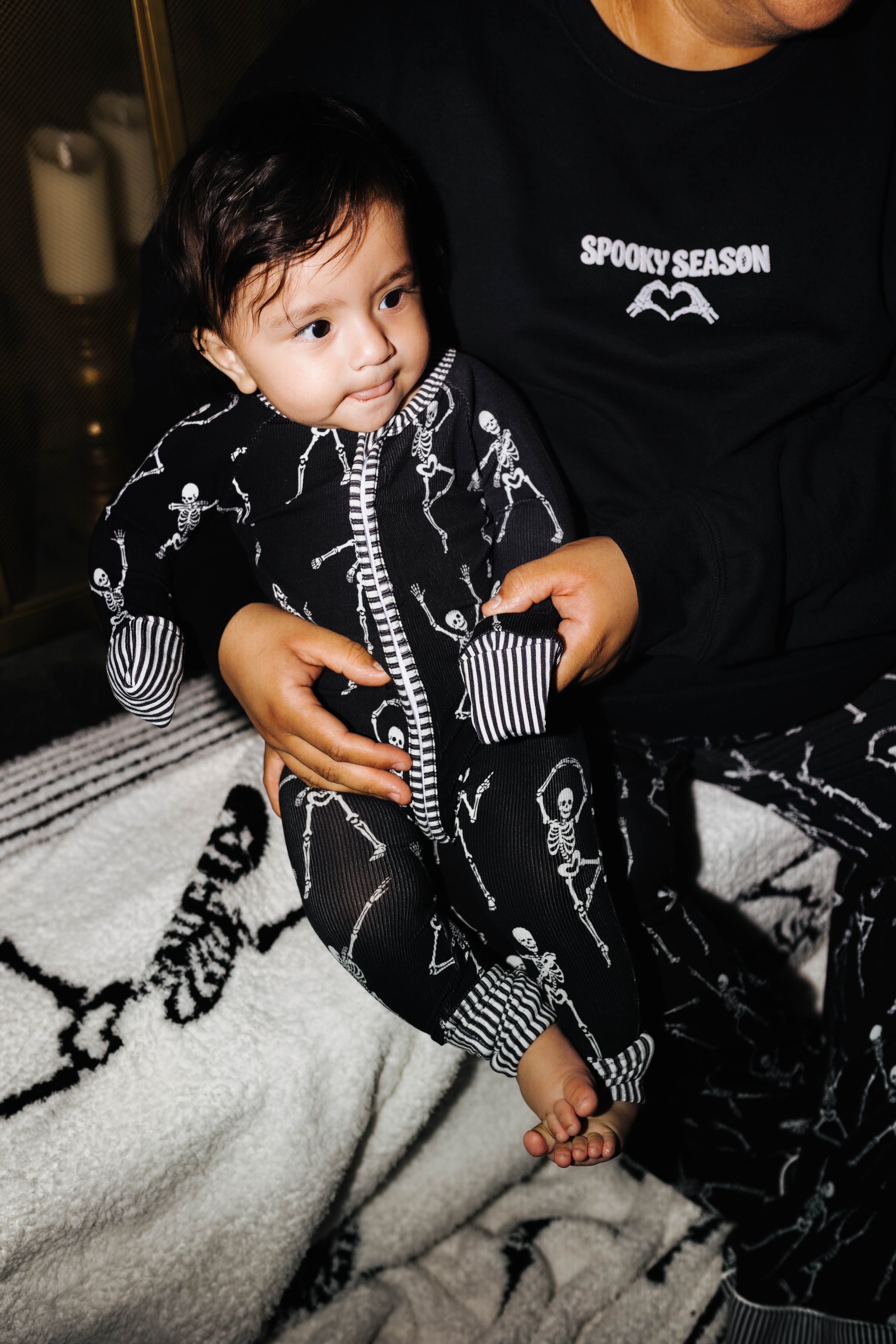 Baby Skelly Ribbed Zip Pajamas shown in a second full length view