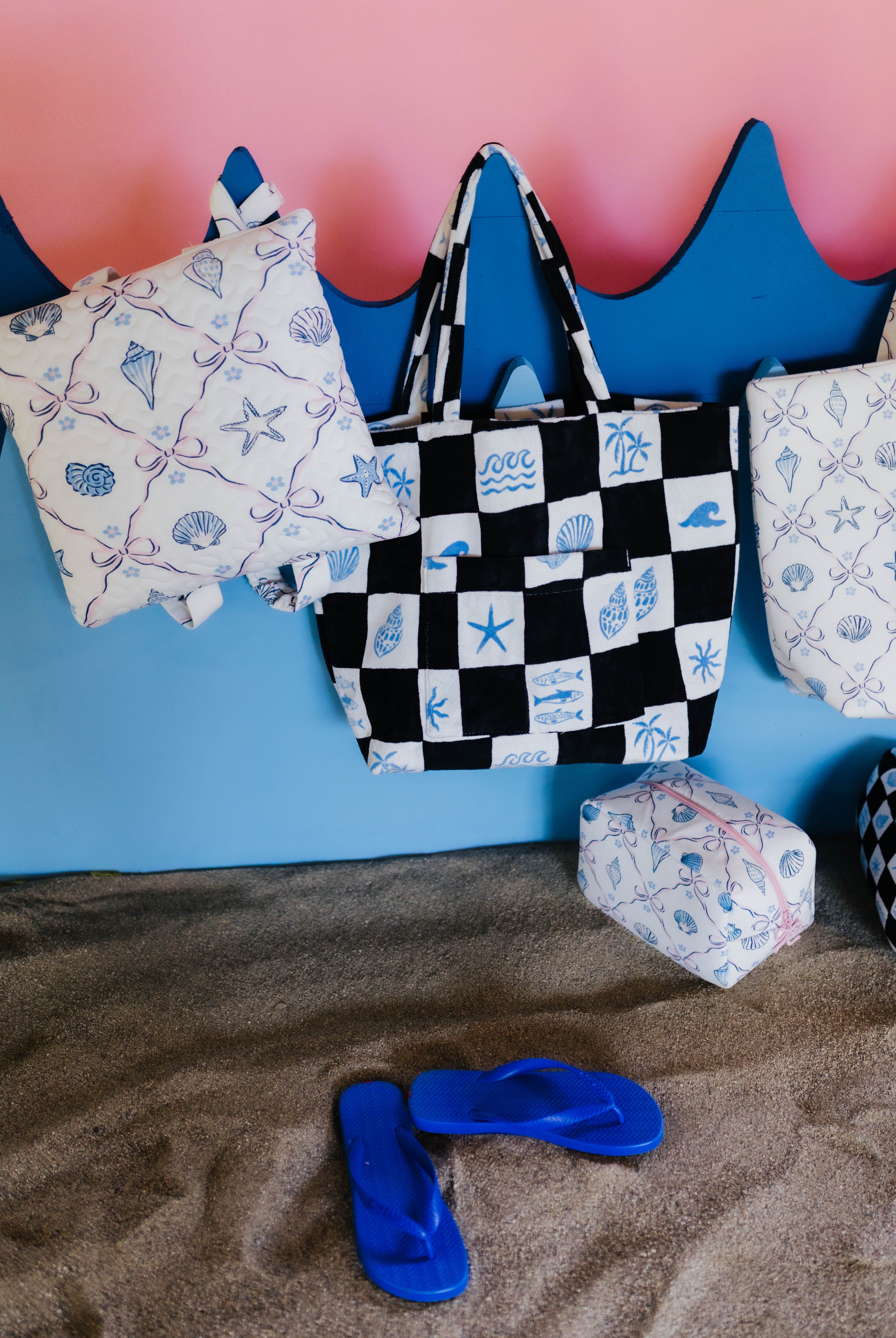 tote bags with sand underneath them