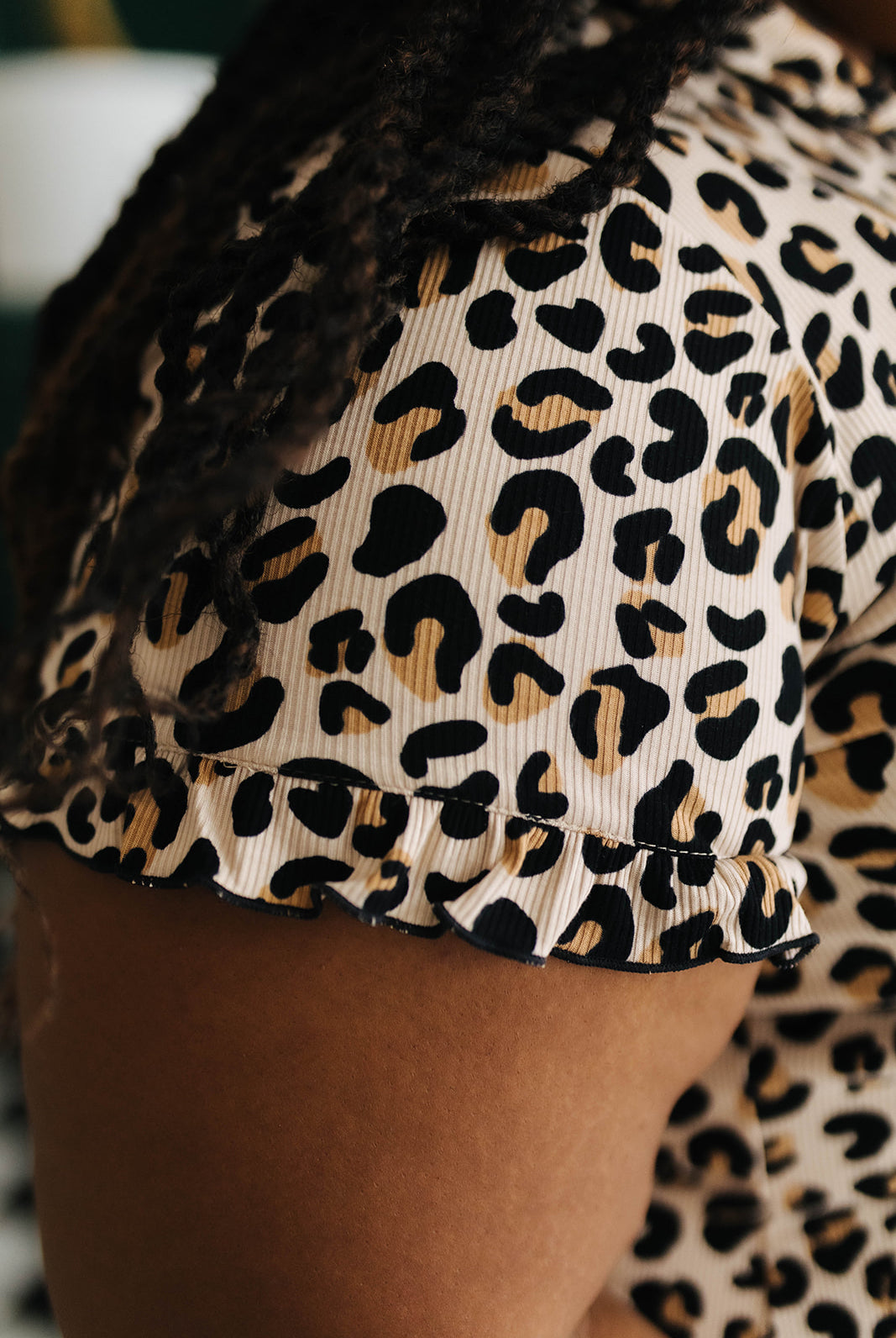 Close-up of a leopard print pj top with a blurred background