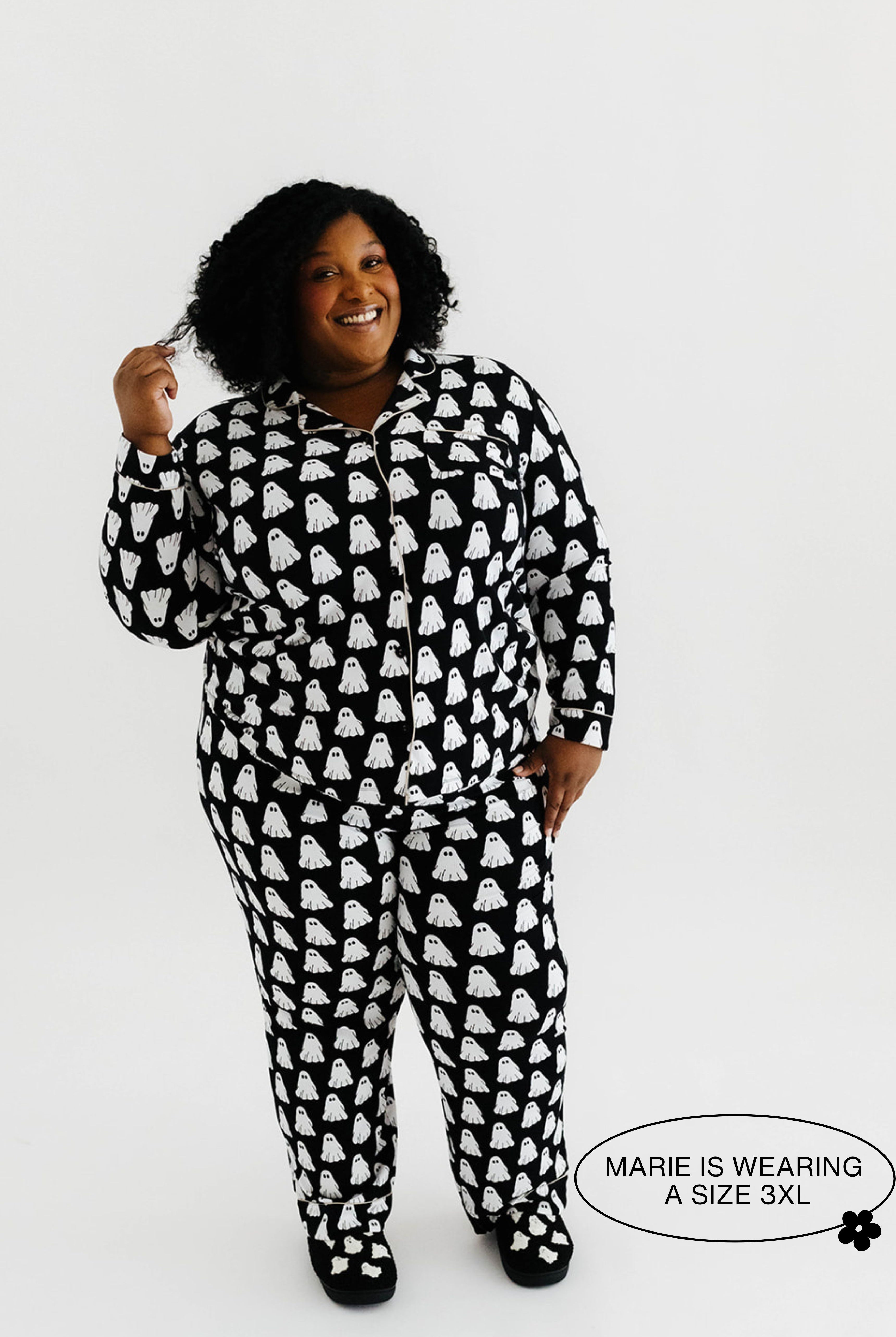 model mari smiling wearing the size 3x in the ghost pajamas