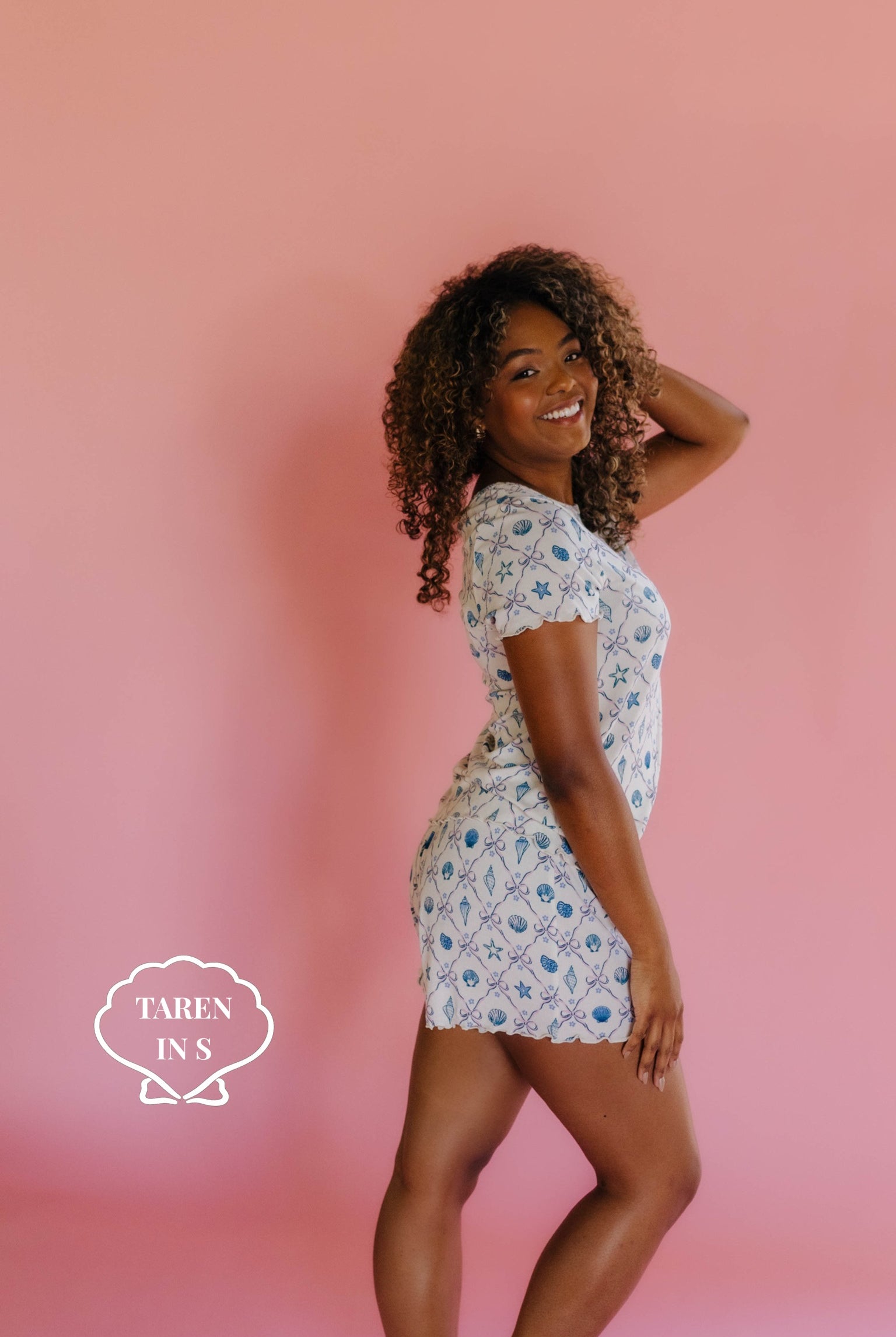 Woman wearing a shell pj set in size S