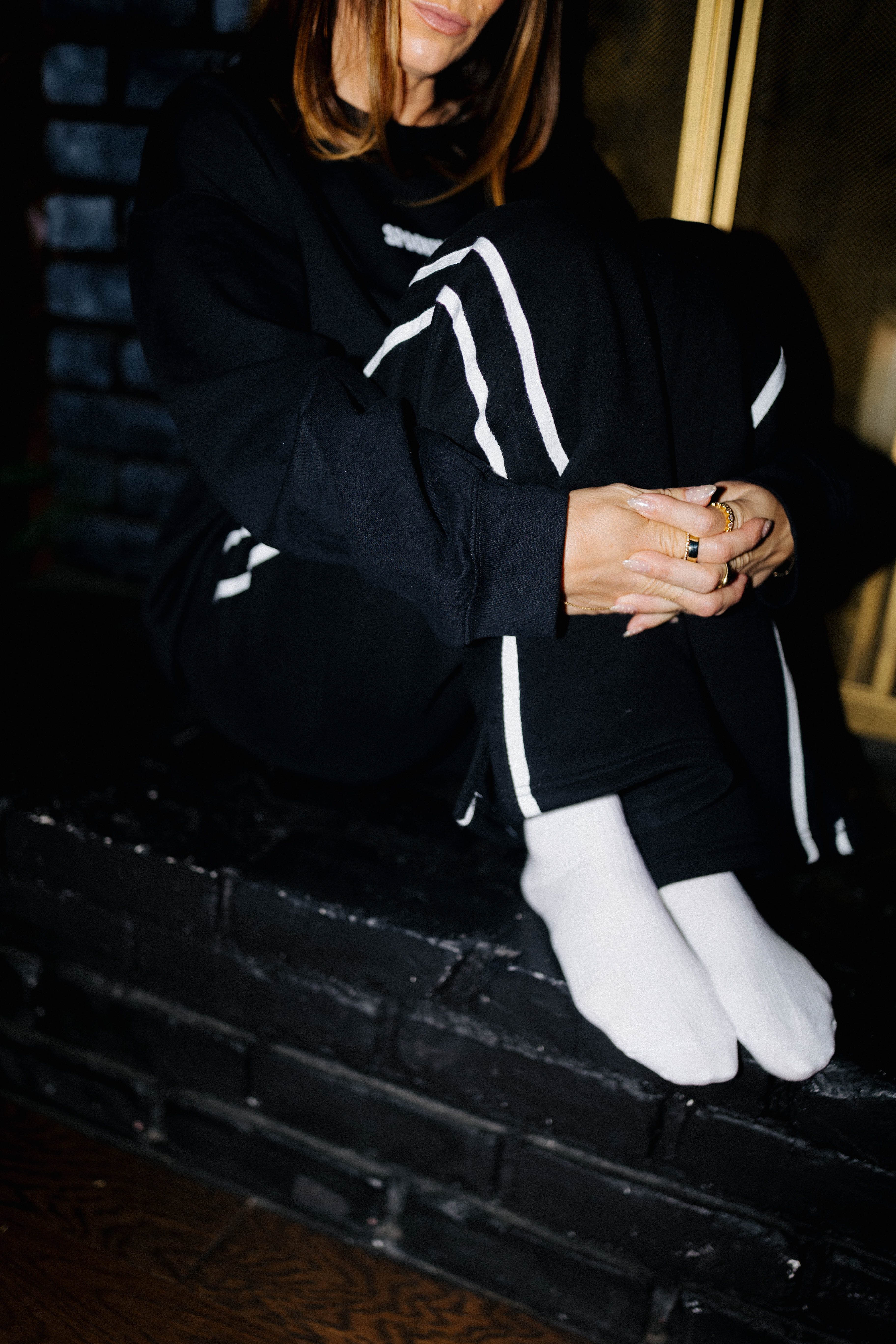 Black Sweatpants styled in the Halloween campaign setting