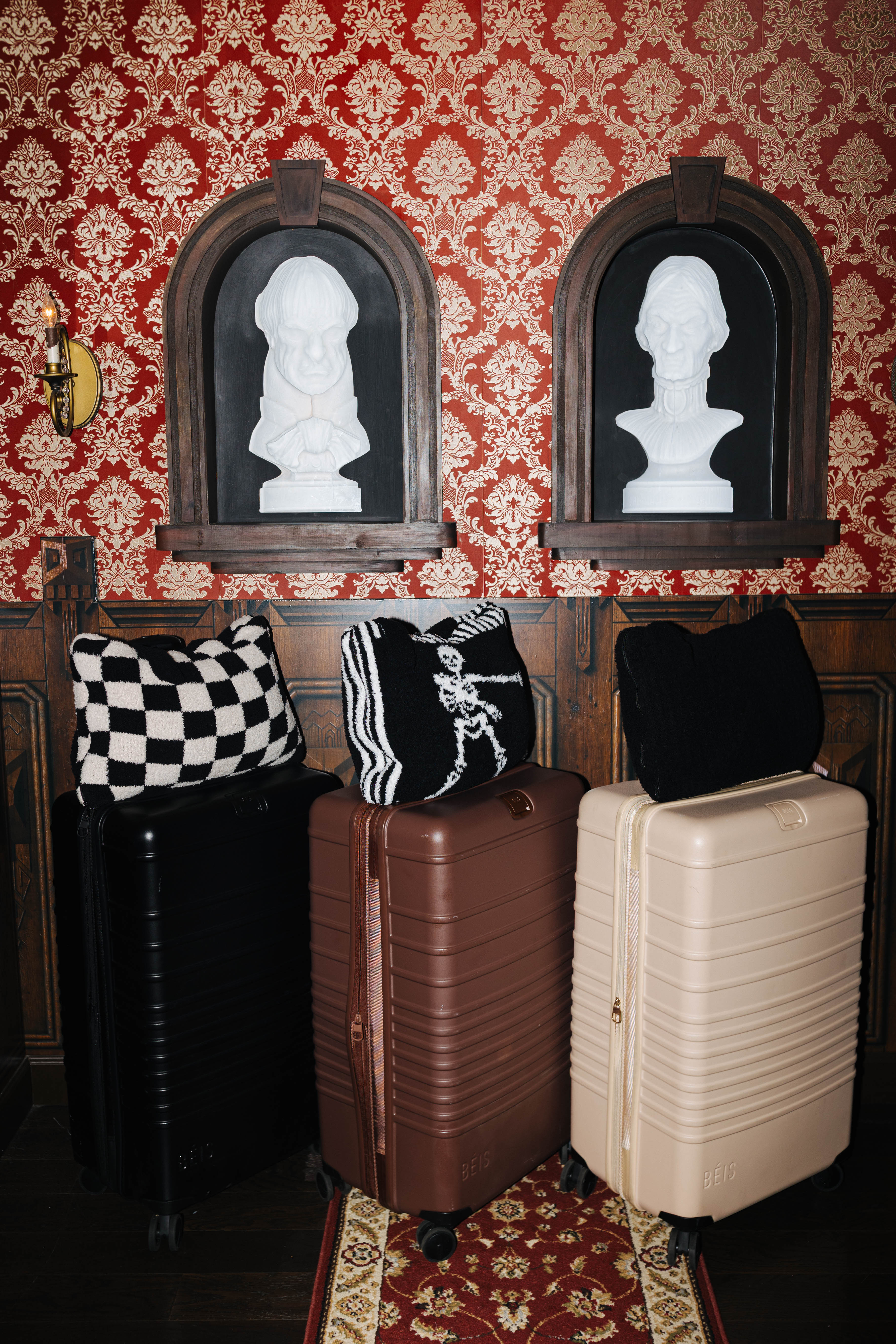 Staykation Halloween collection lifestyle photo featuring Black Waffle Quillow 50x60 and Black Waffle Fringe Blanket 90x90 and Sand & Black Check Quillow 50x60