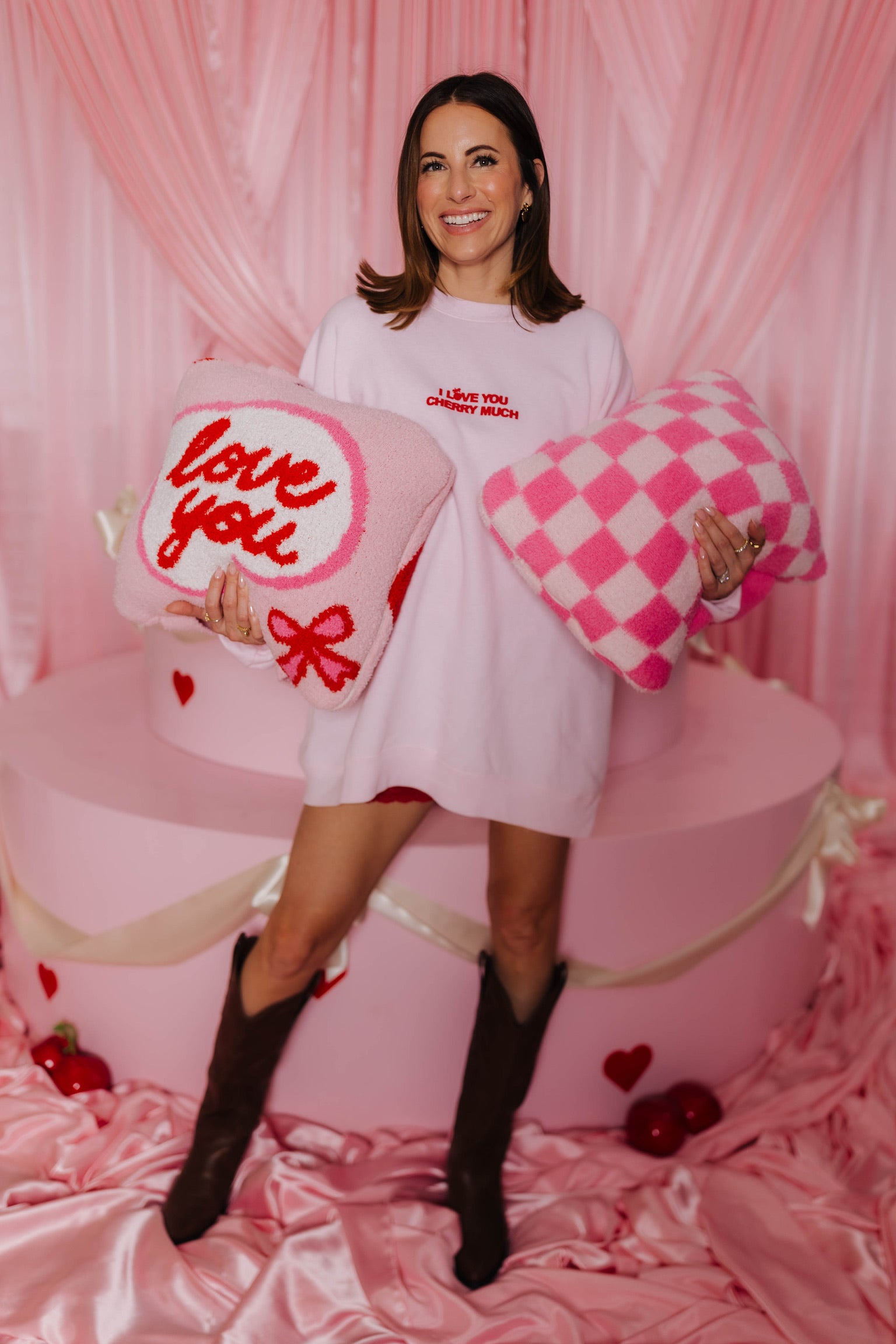 Krista holding the love you quillow and pink tonal quollow