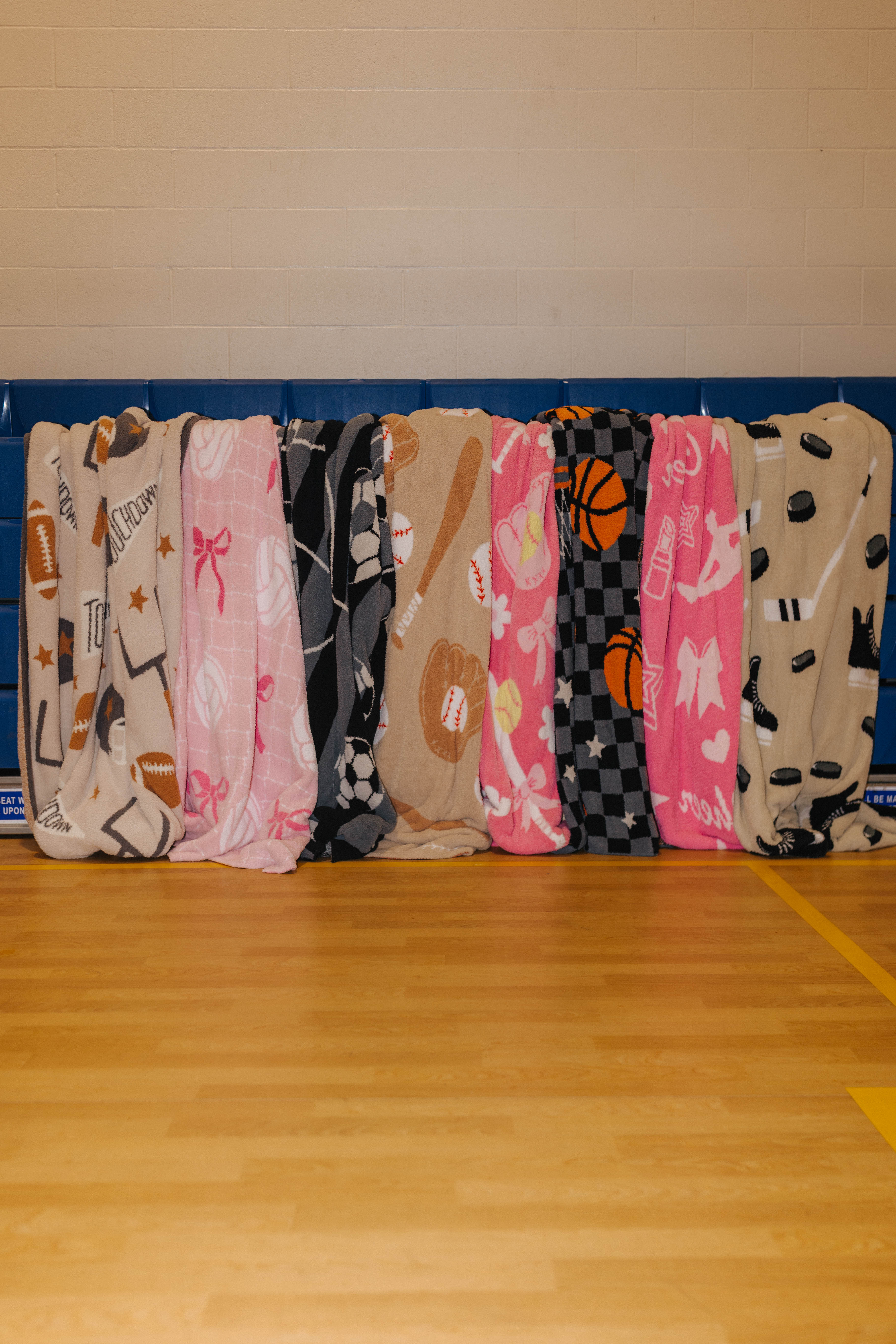 picture of all of the sports blankets together