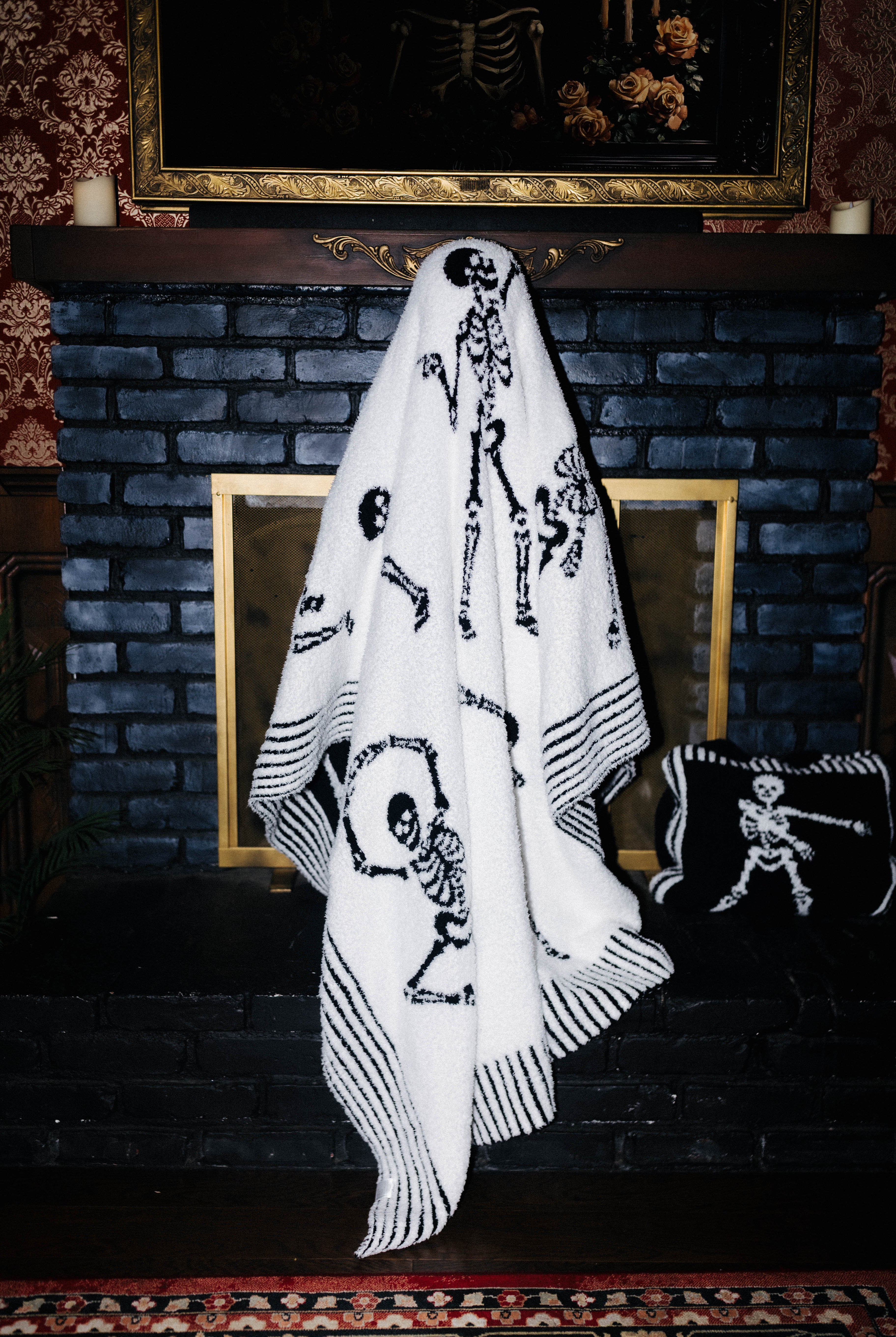 Skelly Blanket 60x80 styled in the Halloween campaign setting