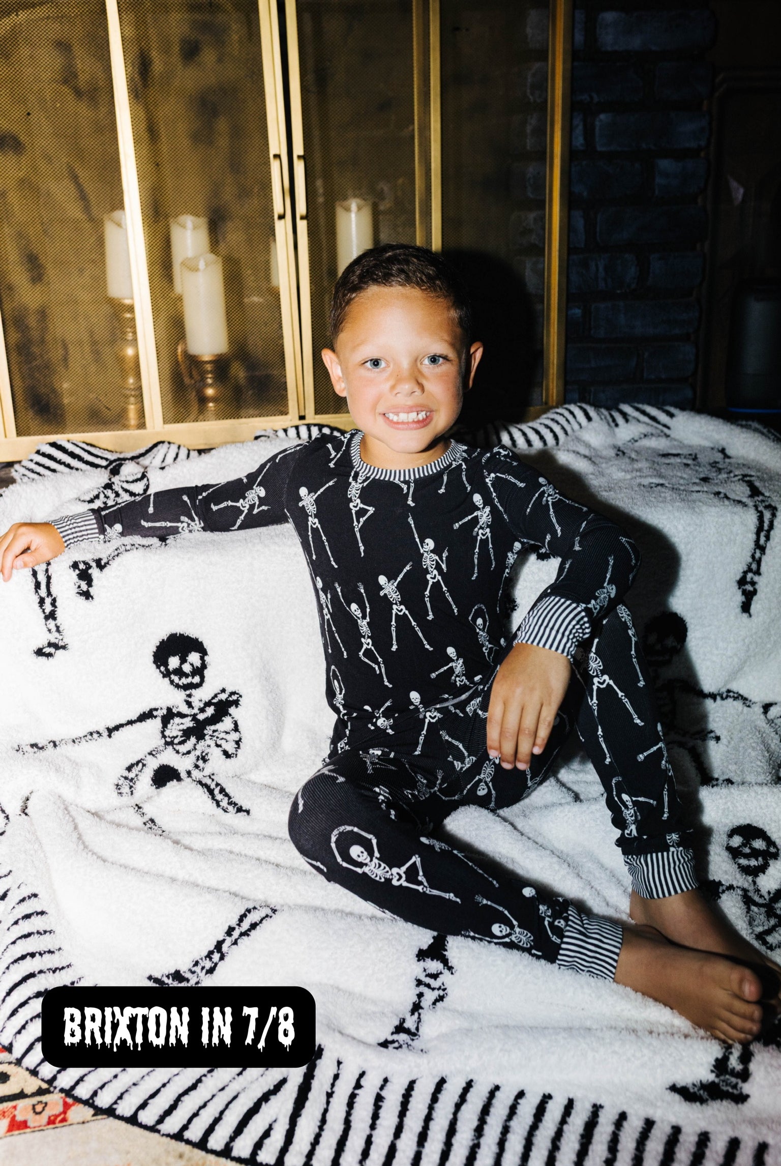 Britton wearing size 7/8 in the Kid Skelly Ribbed Pajama Set