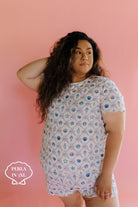 Woman wearing a shell pj set in size 3xl