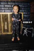 Benson wearing size 4T in the Kid Skelly Ribbed Pajama Set