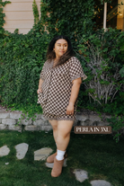 Sizing photo: Perla in 3XL wearing brown check pajama set.