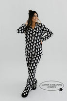 model mayra showing the size medium in the ghost pajamas